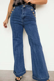 High-rise wide-leg denim jeans with gold button detail and rolled-edge flare leg