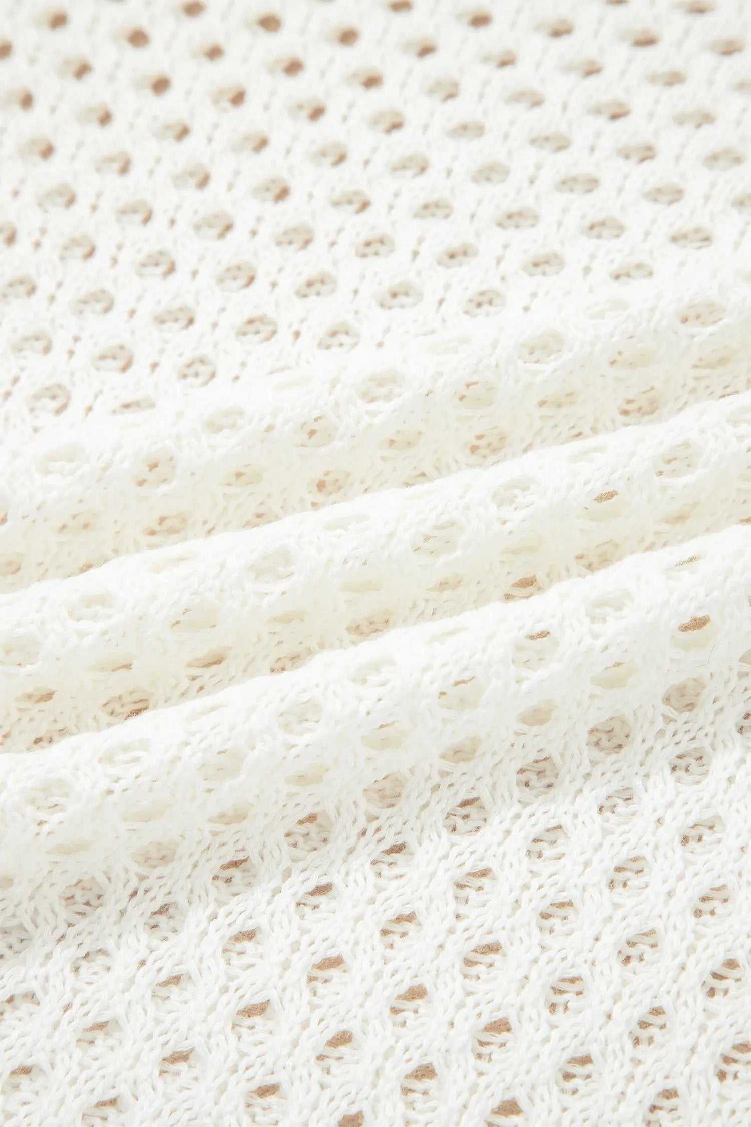 Hollow Out Knit Top with scalloped trim and long sleeves