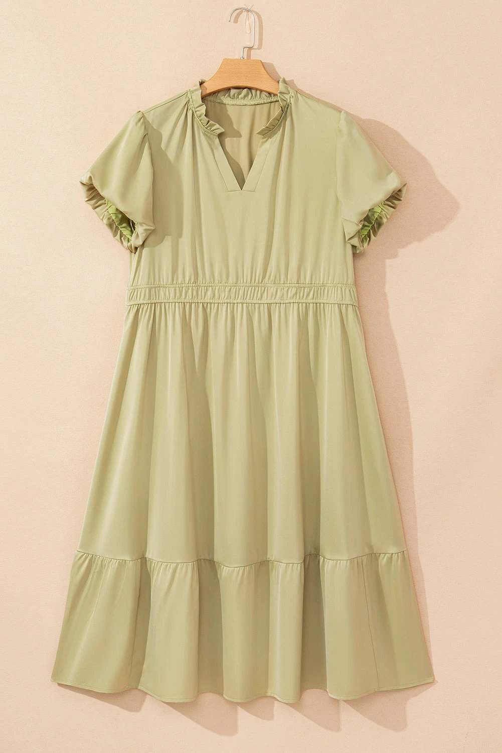 Plus size notched v-neck puff sleeve tiered maxi dress on model