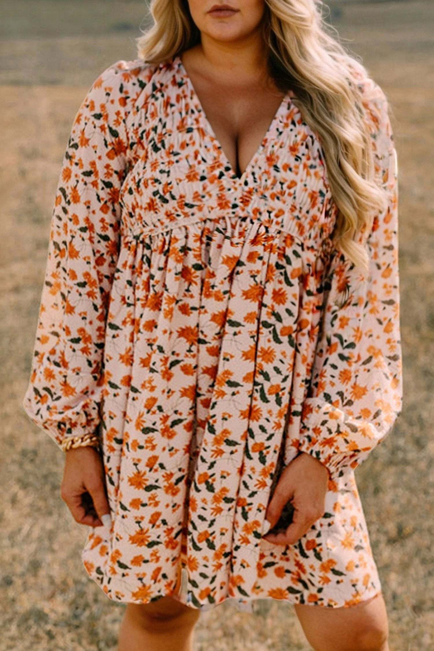 Plus size floral print V-neck long sleeve babydoll mini dress in orange and cream