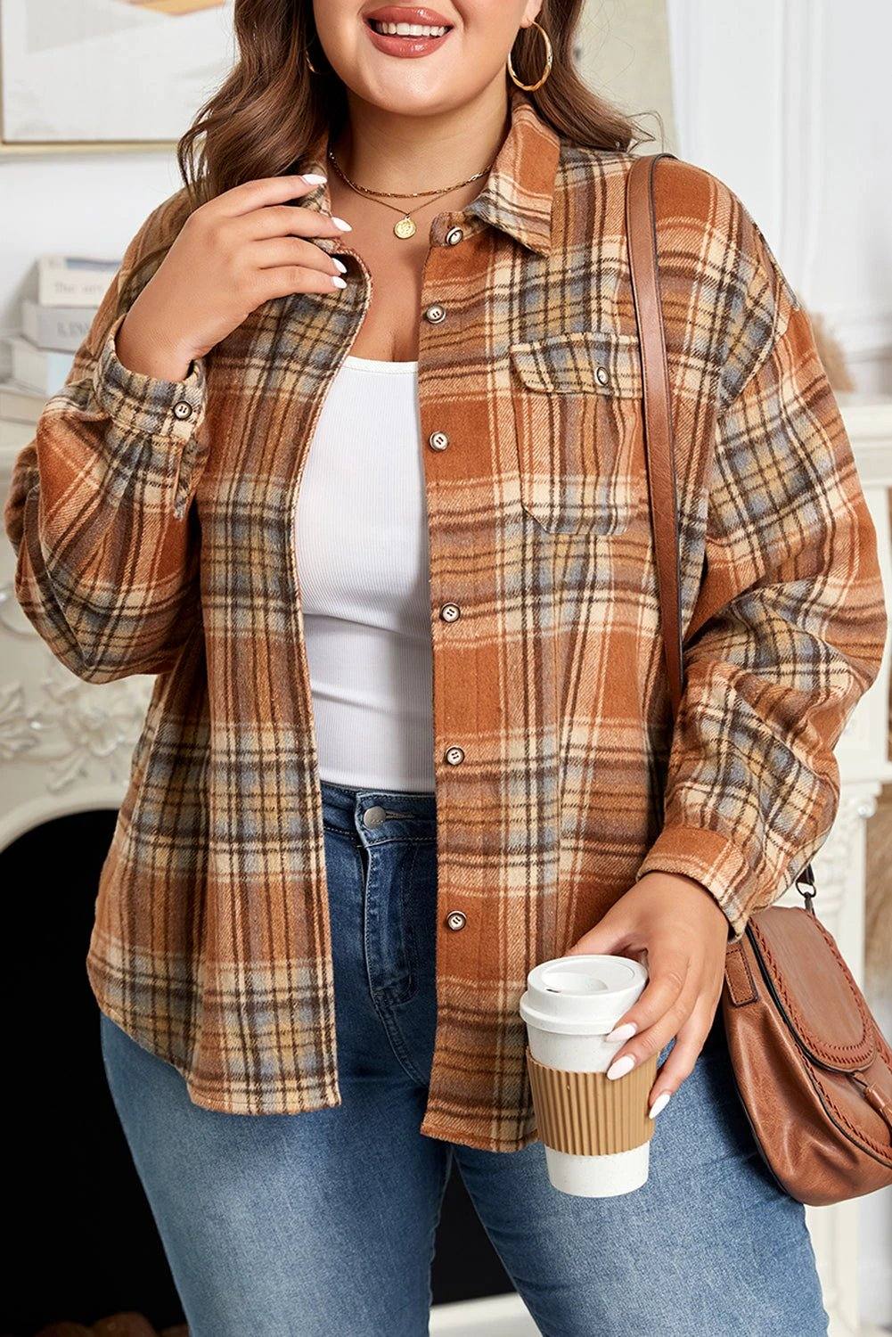 Plus size plaid western shacket with flap pockets and button closure in neutral tones