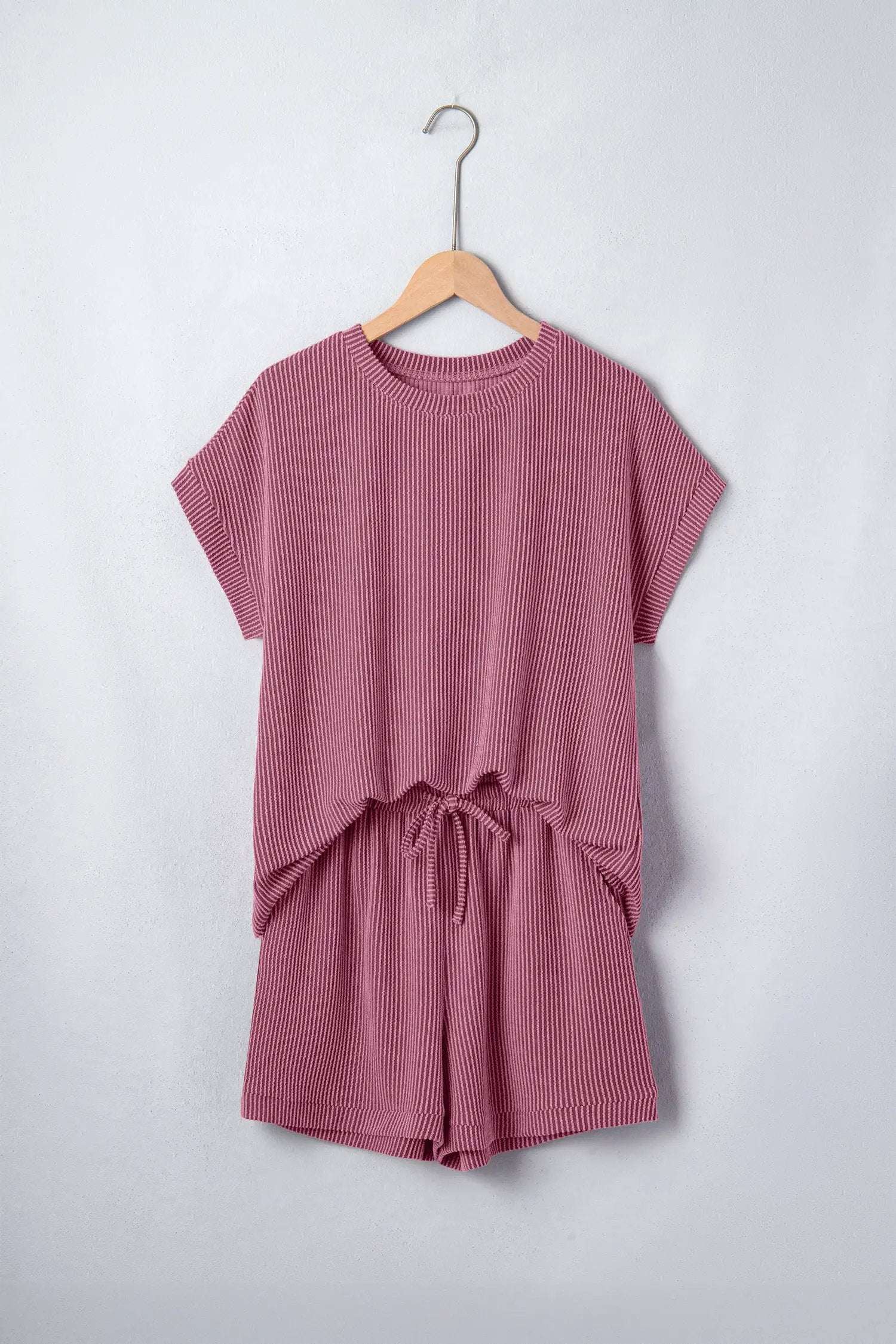 Soft pink twisted ribbed two-piece set with loose tee and shorts for casual mom style