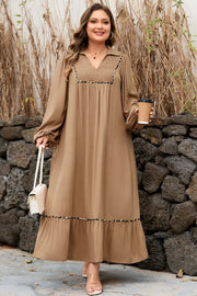 Plus size Southern Charm smocked V-neck dress with leopard piping and flowy maxi skirt