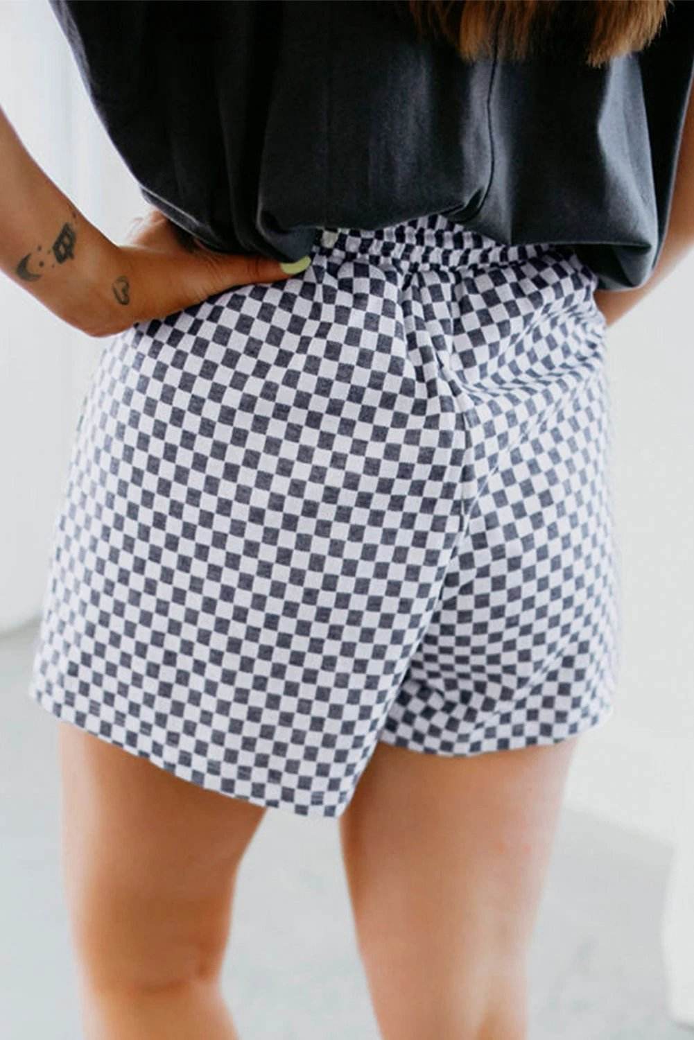 Plus size checkerboard lace-up high waist shorts with drawstring showcasing mom energy style