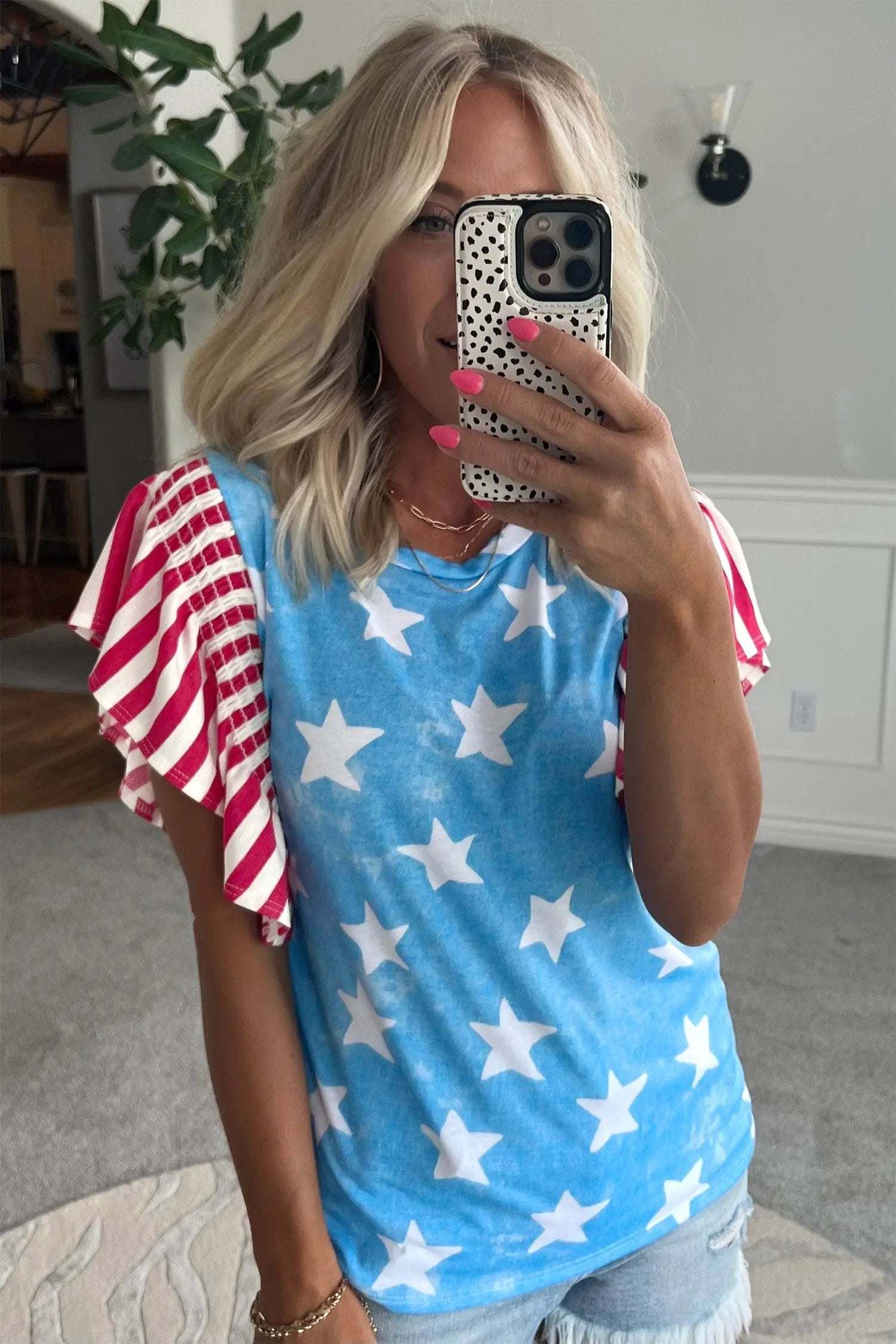 Patriotic Ruffle Sleeve Top with star print striped detail and ruffle sleeves
