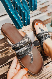 Leopard studded animal print flip flop sandals with cushioned footbed and multi-strap design