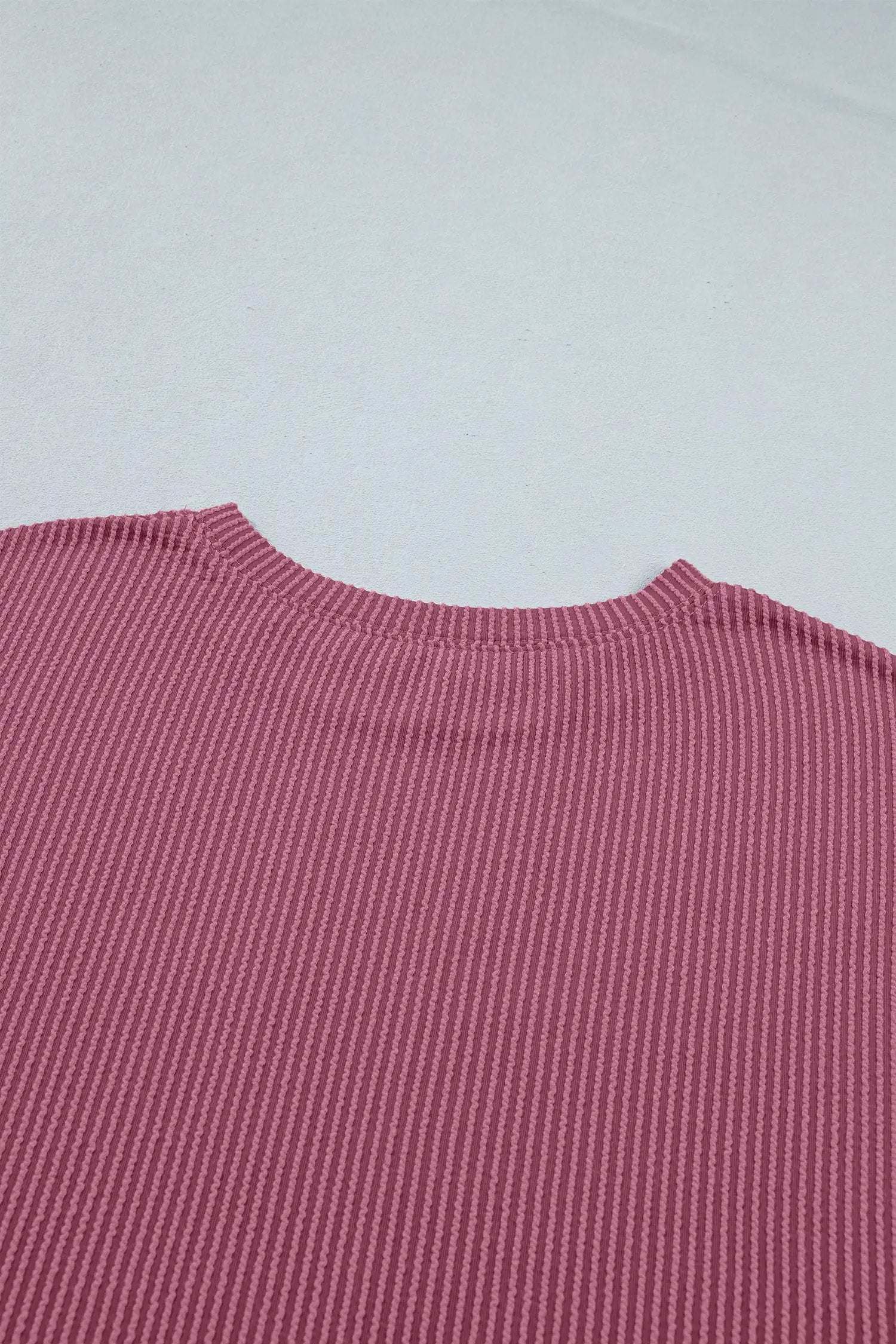 Soft pink twisted ribbed two-piece set with loose tee and shorts for casual mom style