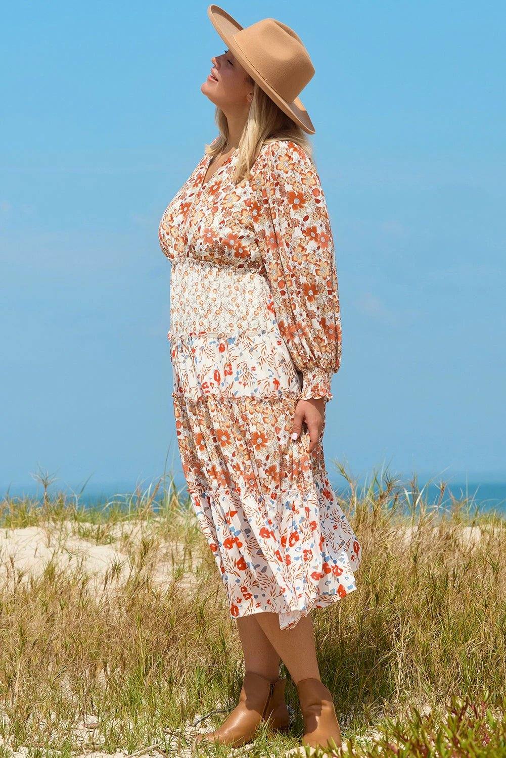 Plus size boho floral tiered ruffle maxi dress with long sleeves and flowing skirt featuring Main Character Energy style