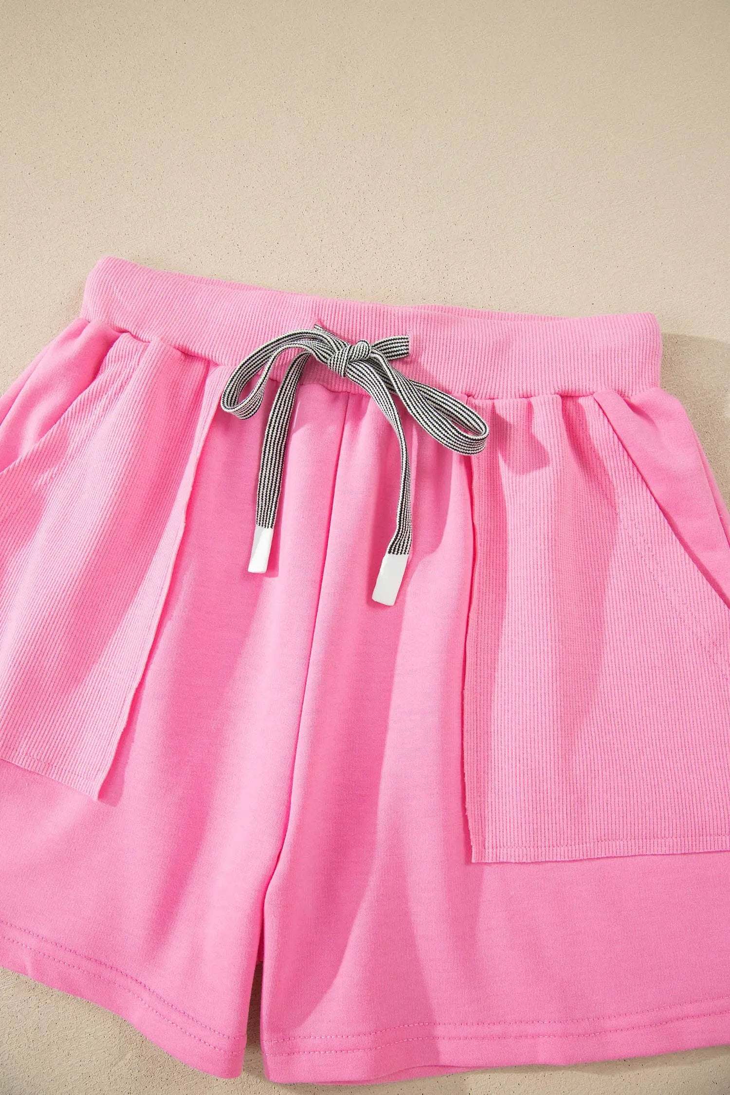 Pink Mom Chic two-piece V-neck top and drawstring shorts outfit set