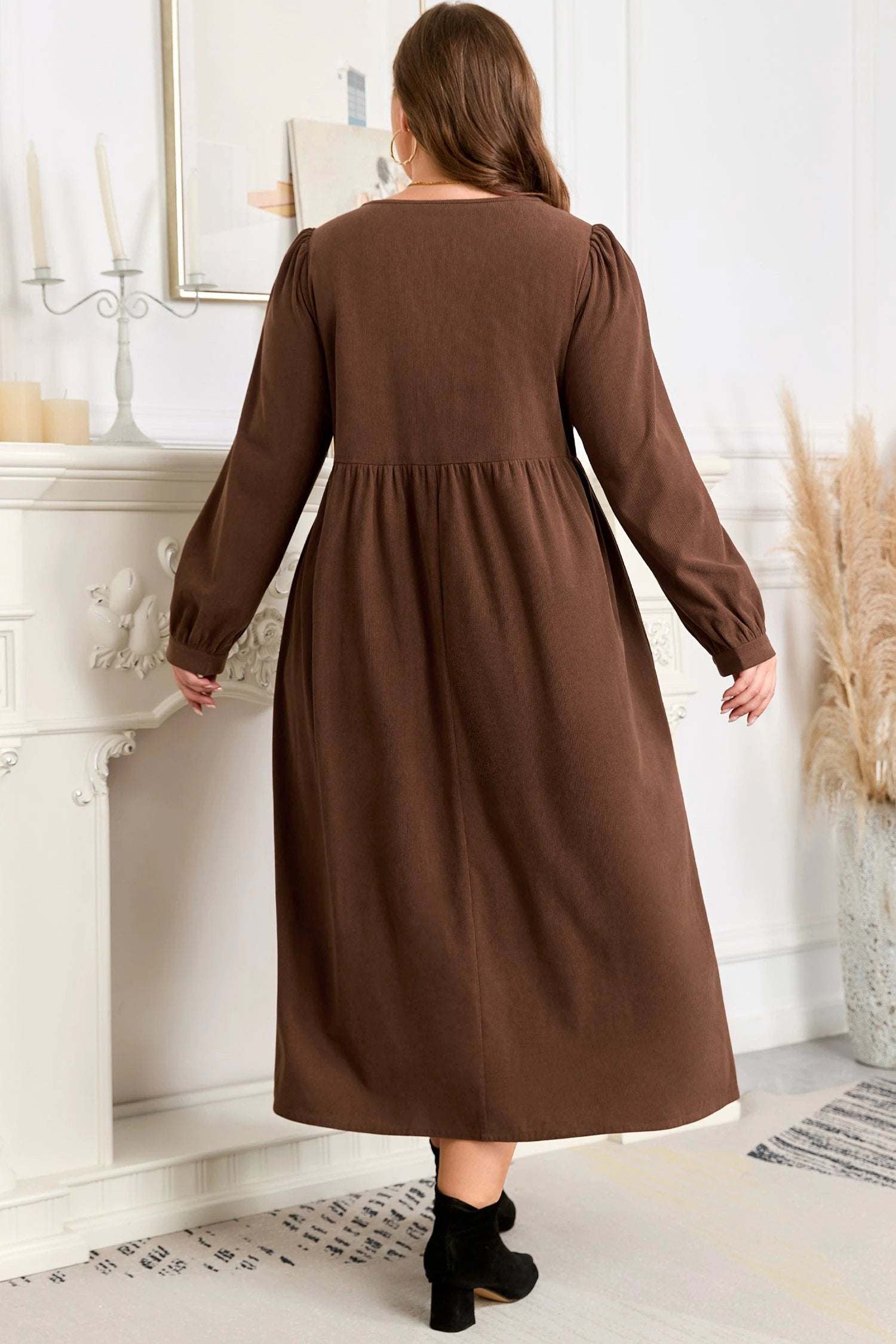 Plus size embroidered notched-neck midi dress with main character energy and boutique-ready silhouette