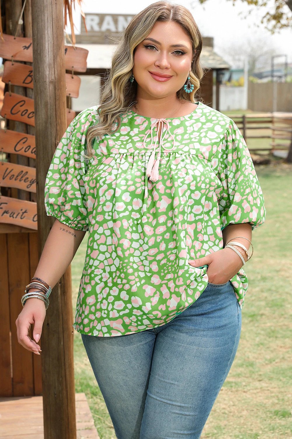 Green plus size floral blouse with tassel tie split neck and puff sleeves