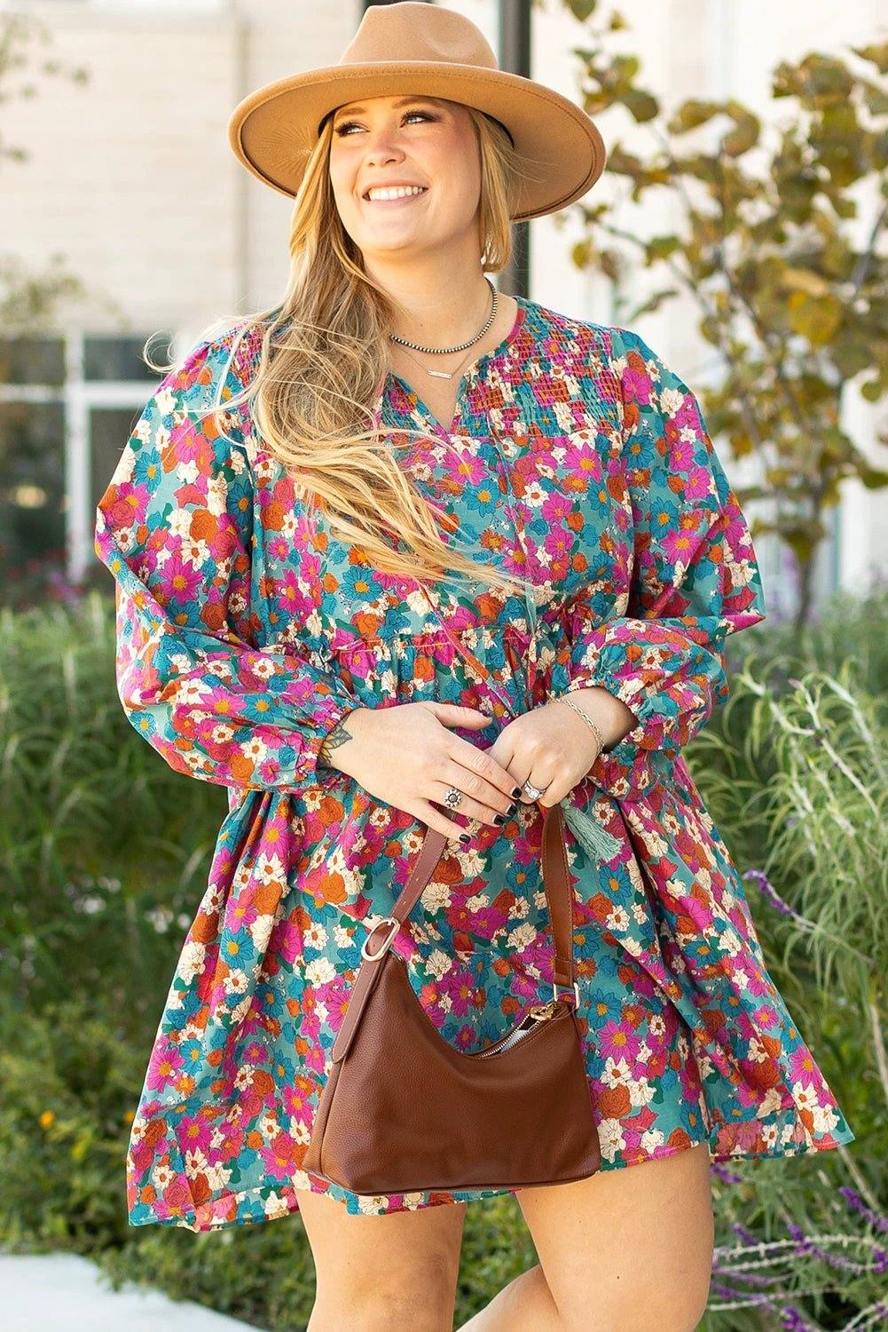 Plus size floral shirred ruffle tiered mini dress with lightweight fabric and flattering silhouette
