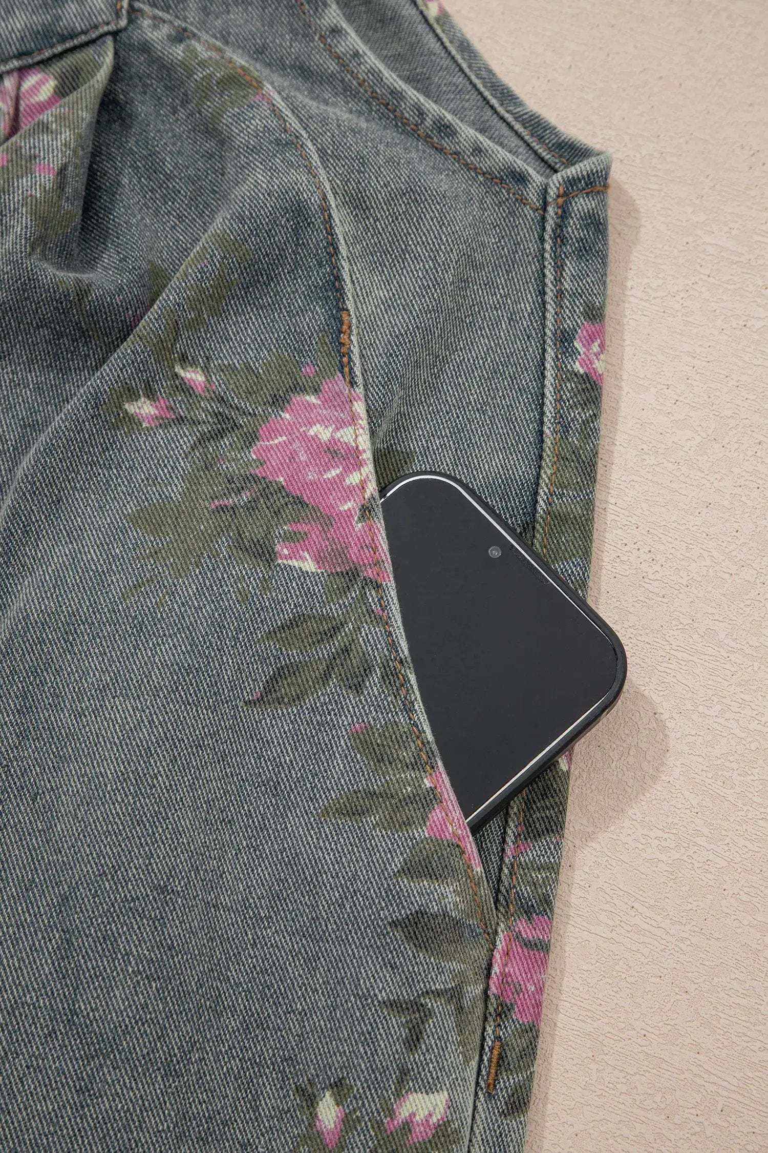 Floral Denim Jumpsuit with pleated high-waist and wide-leg silhouette
