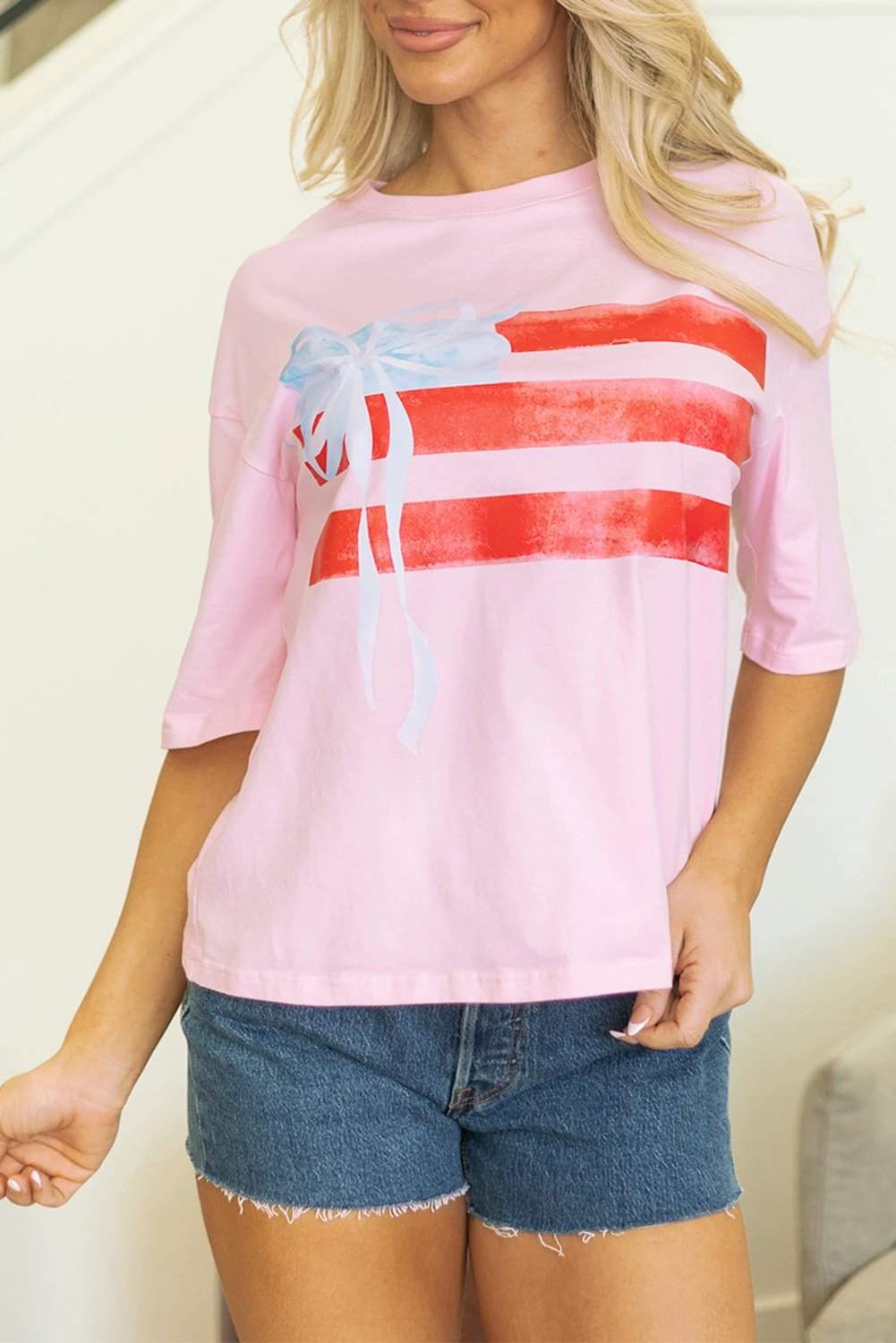 light pink flag bow graphic crewneck tee for women casual everyday outfit