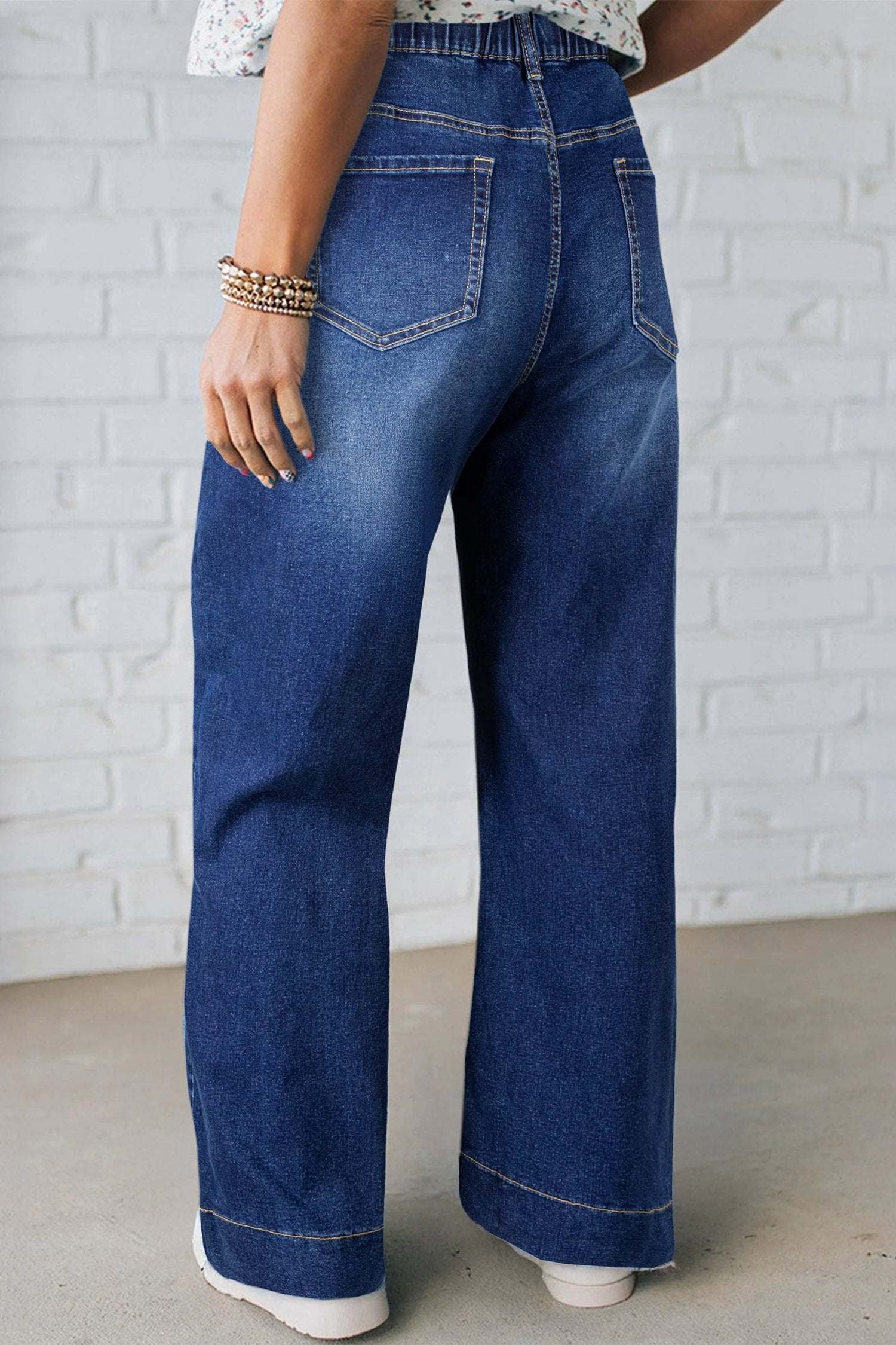 Plus size acid wash lace-up high rise wide leg jeans showcasing main character energy style