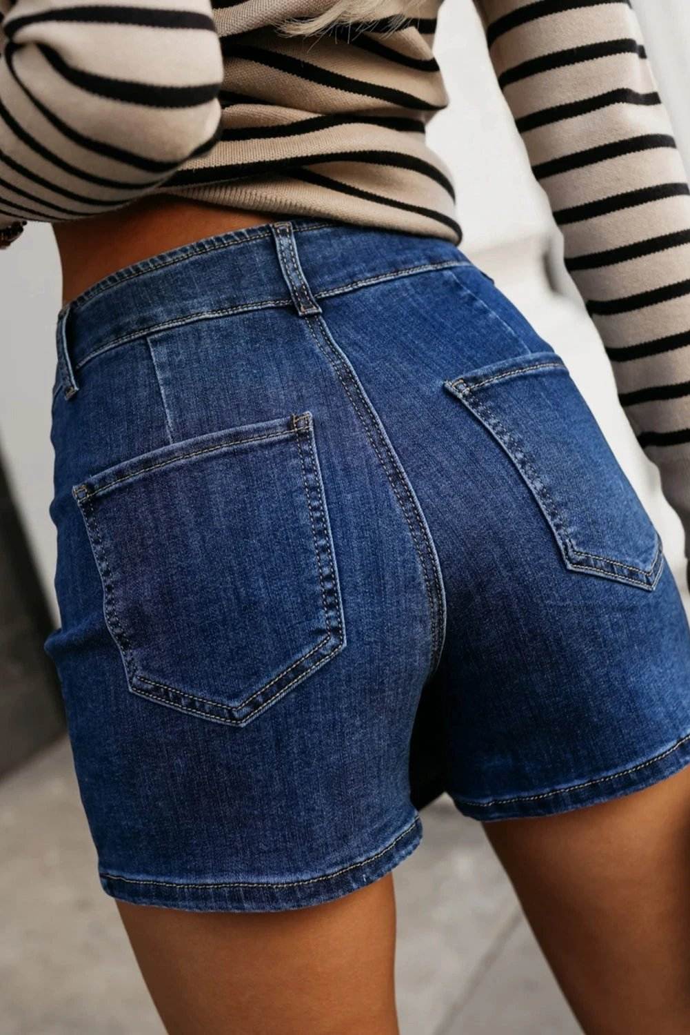 bluing asymmetric wrapped buttoned high waist denim shorts for women casual everyday outfit