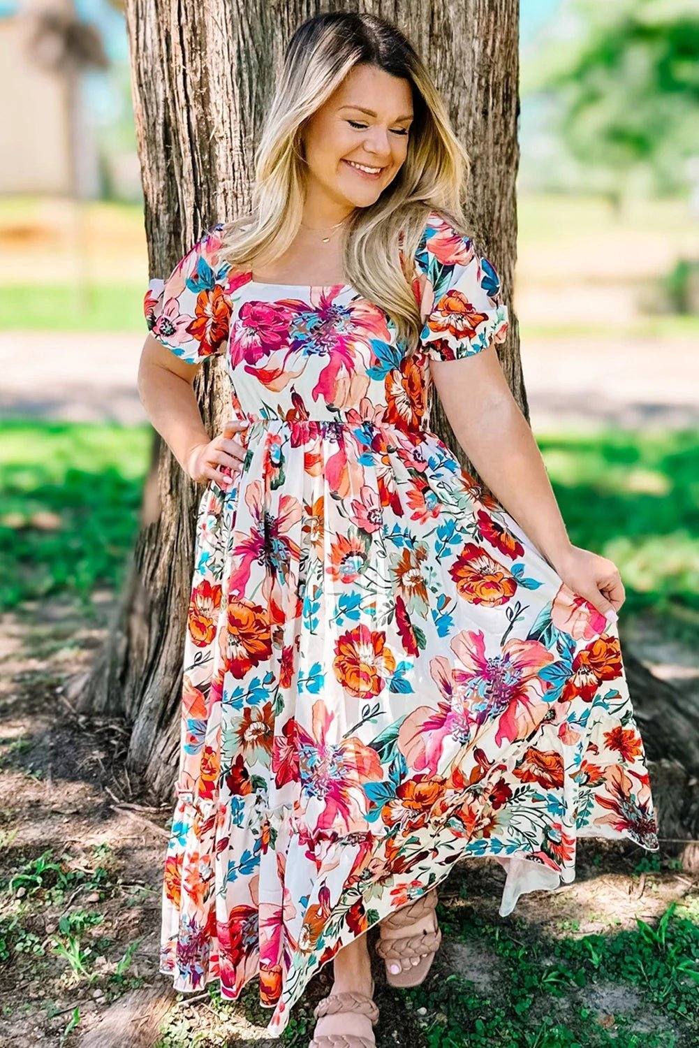 Plus size Sunday Ready floral midi dress with square neckline and puff sleeves on white background