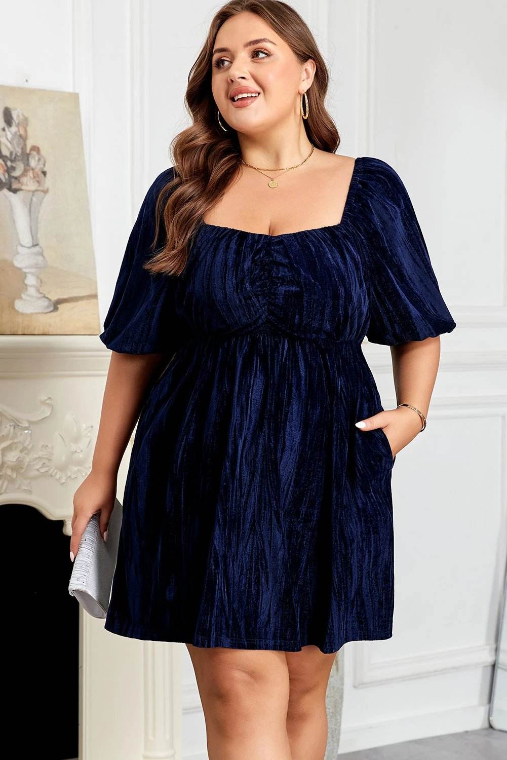 Plus size navy blue velvet dress with ruched bust and square neckline