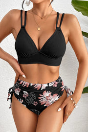 Black ribbed knit high-waist two-piece bikini with floral bottom and double-strap top
