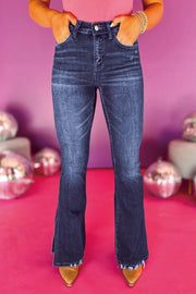 Medium-wash high-waist split-flare jeans with wide-leg silhouette and frayed hem