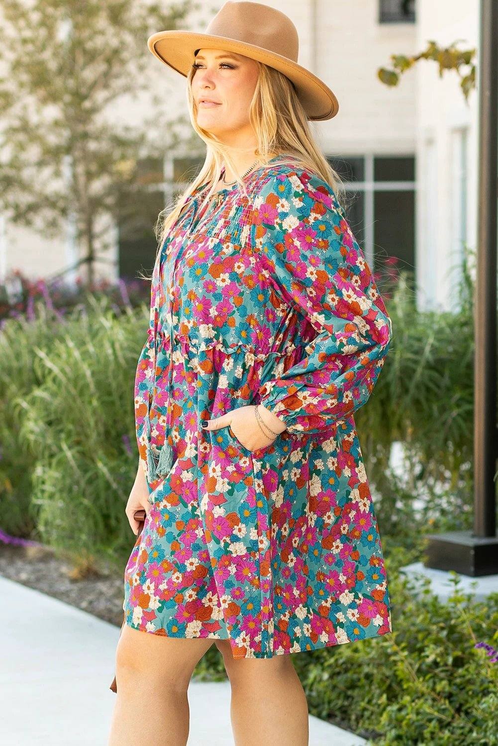 plus size floral print shirred ruffle tiered mini dress on mannequin