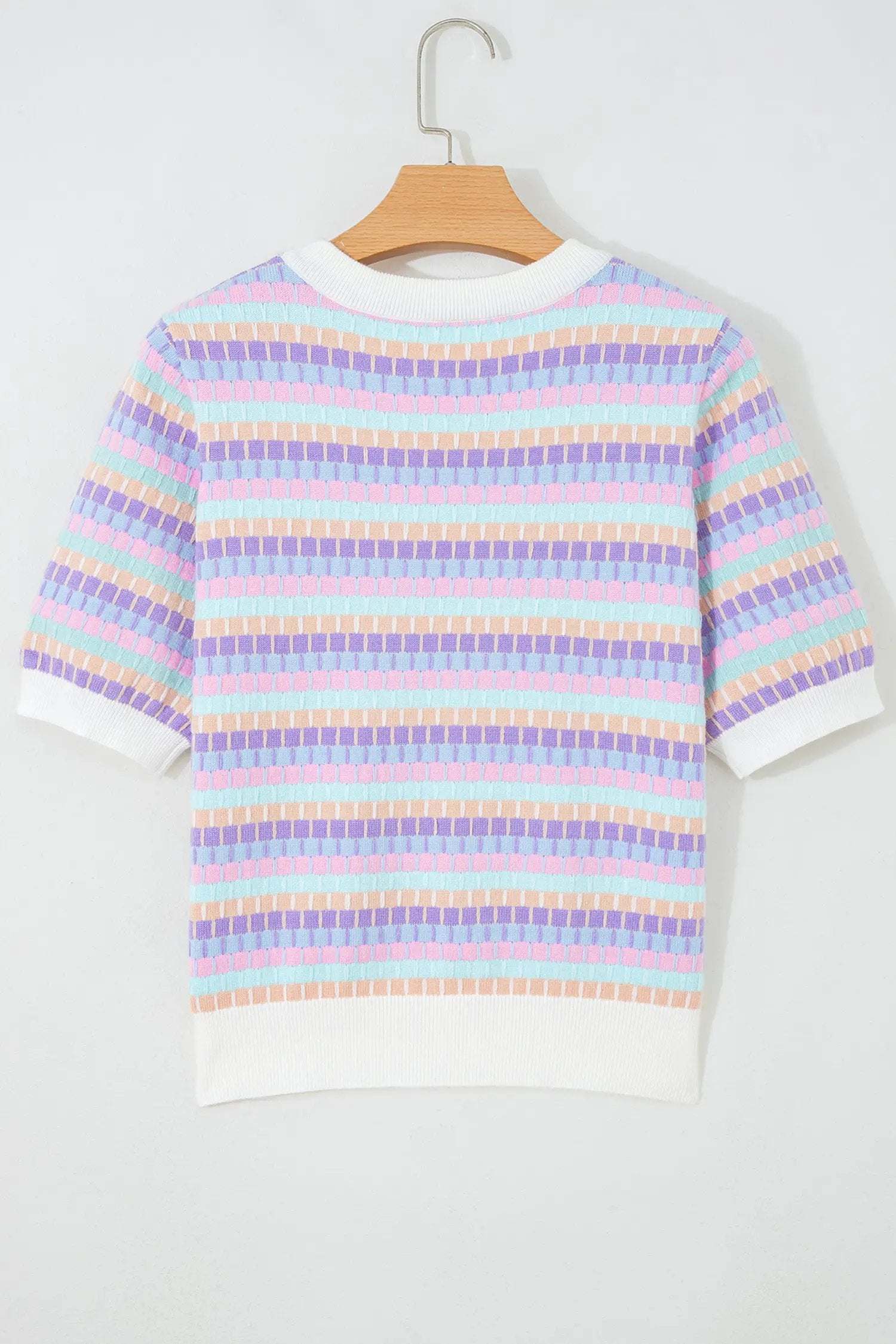Orange striped knit sweater with abstract stripes and contrasting fuchsia pink rib neckline and cuffs