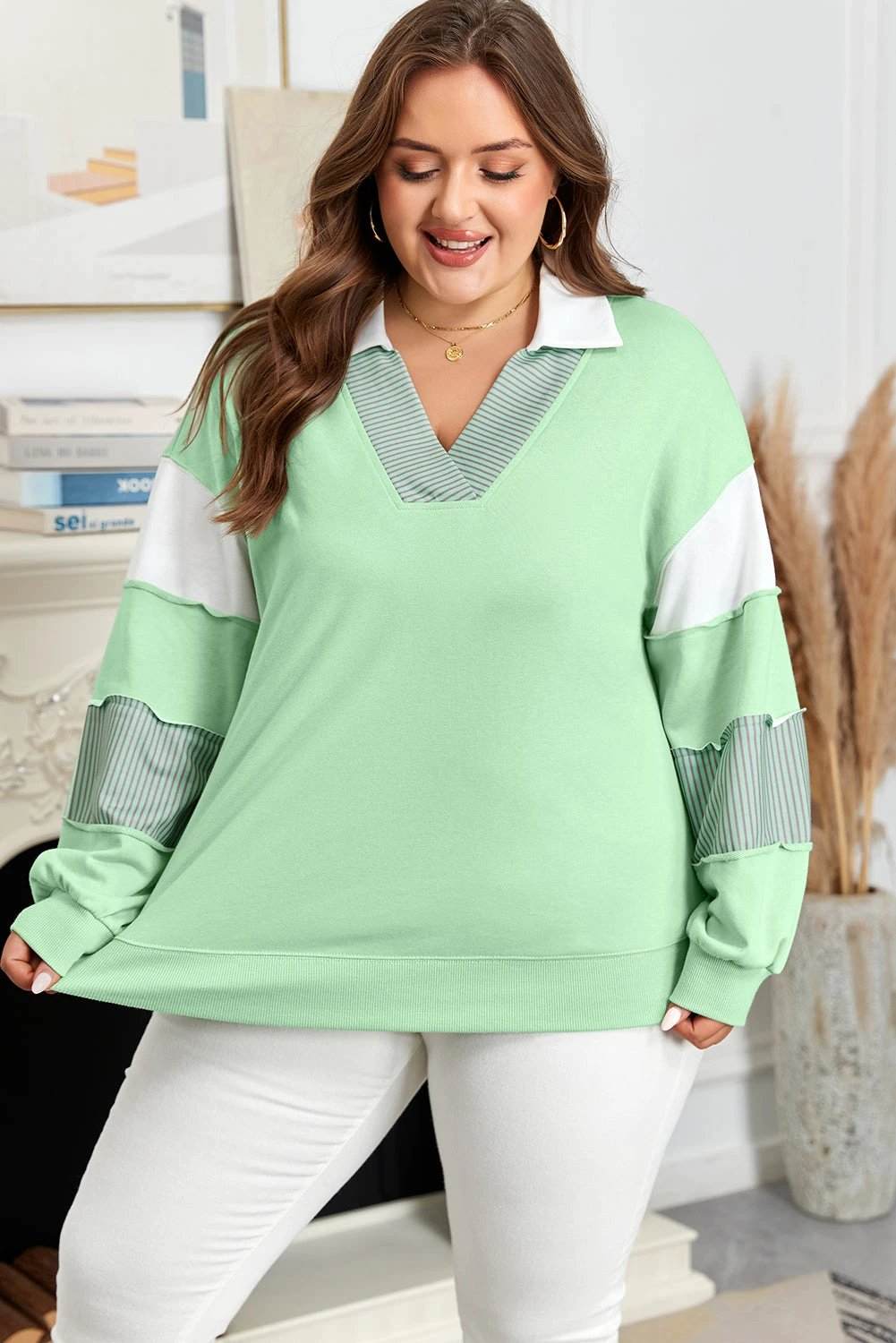 Plus size Cozy Confidence Moment sweatshirt with color block patchwork collar and striped sleeves