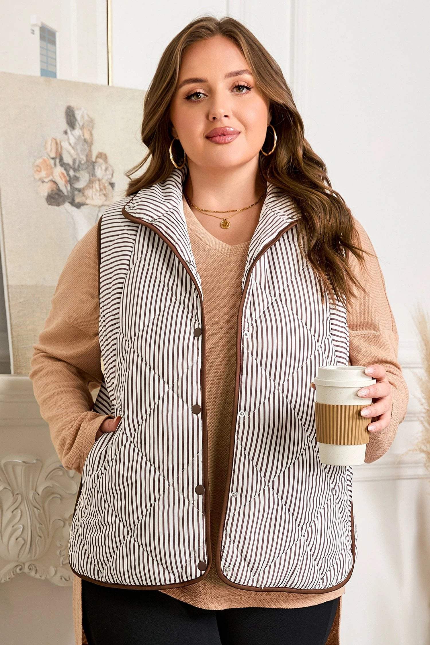 Plus size striped quilted vest with wavy hem and snap buttons