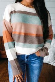 Striped color block knit drop shoulder sweater in soft earthy tones with ribbed cuffs and hem