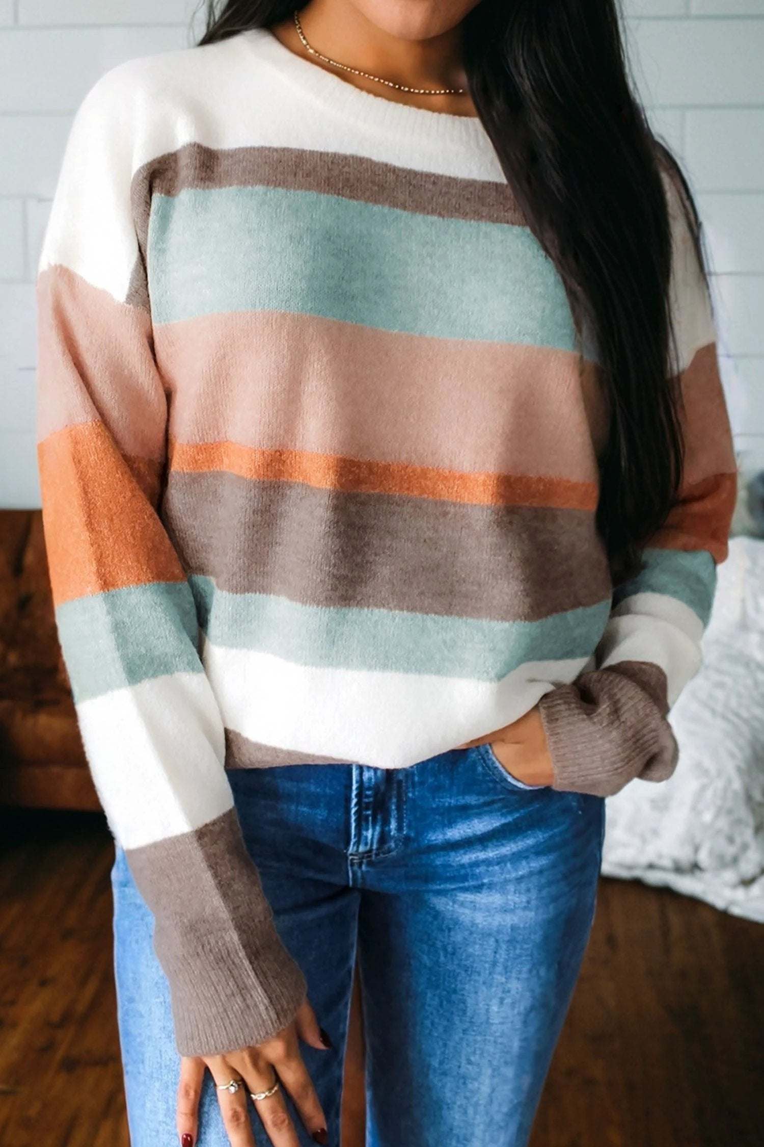 Striped color block knit drop shoulder sweater in soft earthy tones with ribbed cuffs and hem