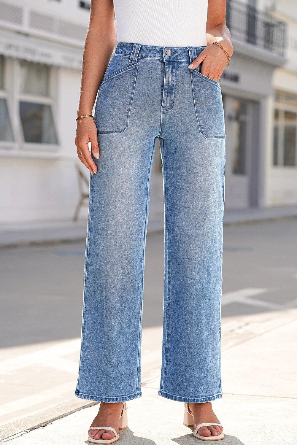 Dirty blue mid-rise straight leg Chic Mom jeans on a white background