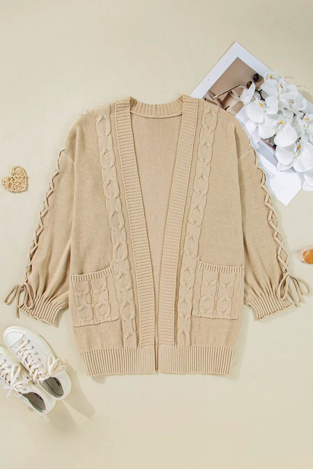 Plus size cable knit open cardigan with braided tie sleeves in khaki