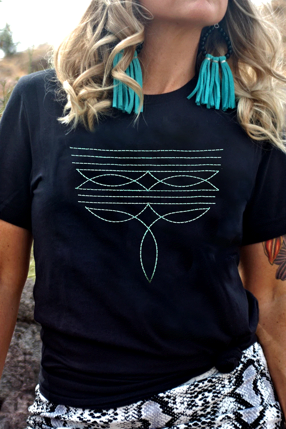 Black Western Geometric Embroidered Tee with teal embroidery and relaxed fit