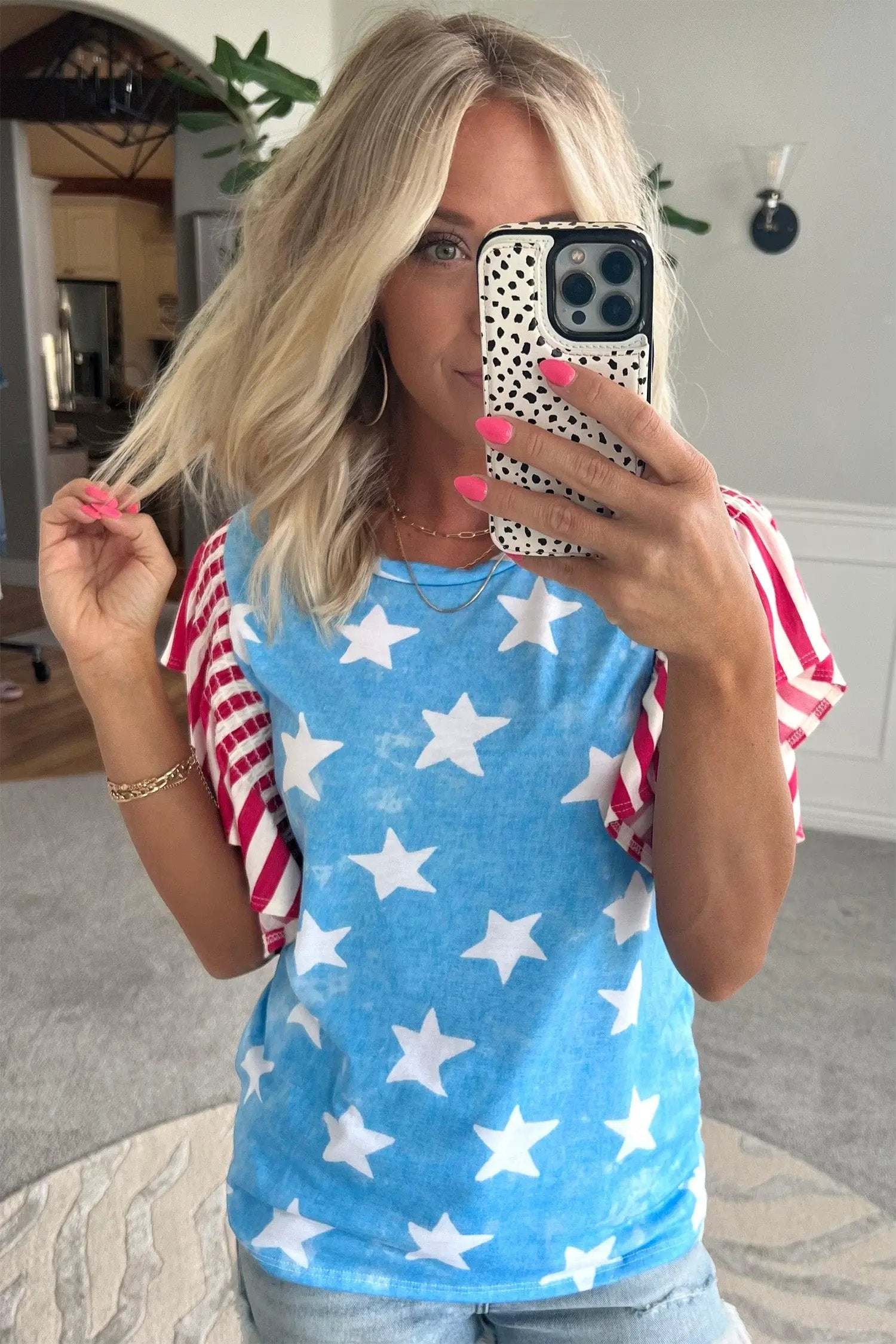 Patriotic Ruffle Sleeve Top with star print striped detail and ruffle sleeves