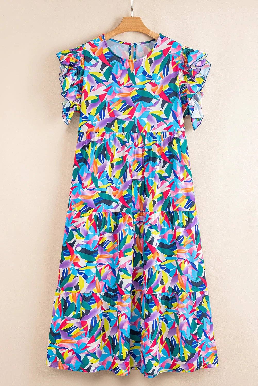 Plus size geometric print tiered maxi dress with ruffled short sleeves and A-line silhouette embodying Main Character Energy.