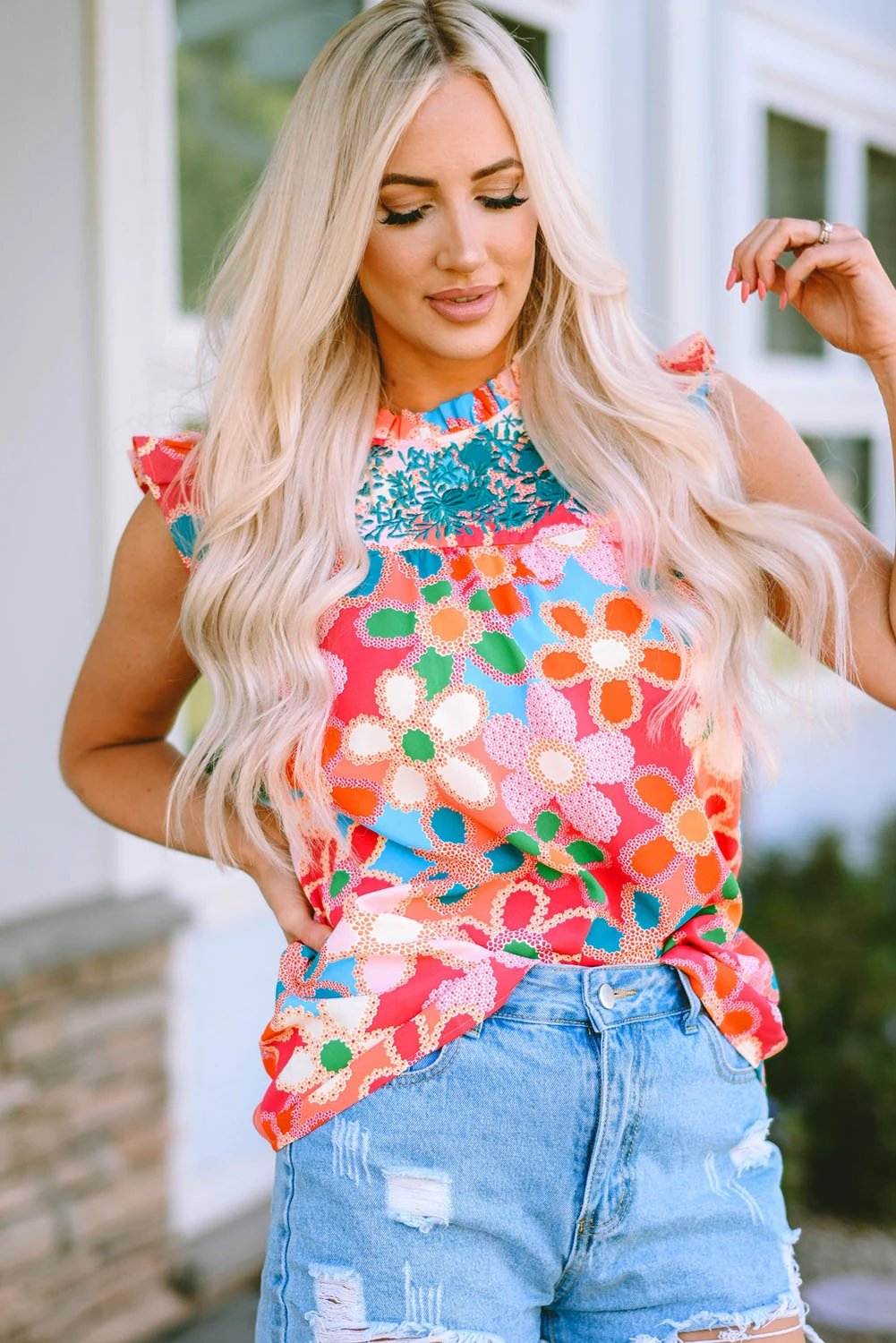 Pink embroidered floral print tank top with ruffle trim for warm weather