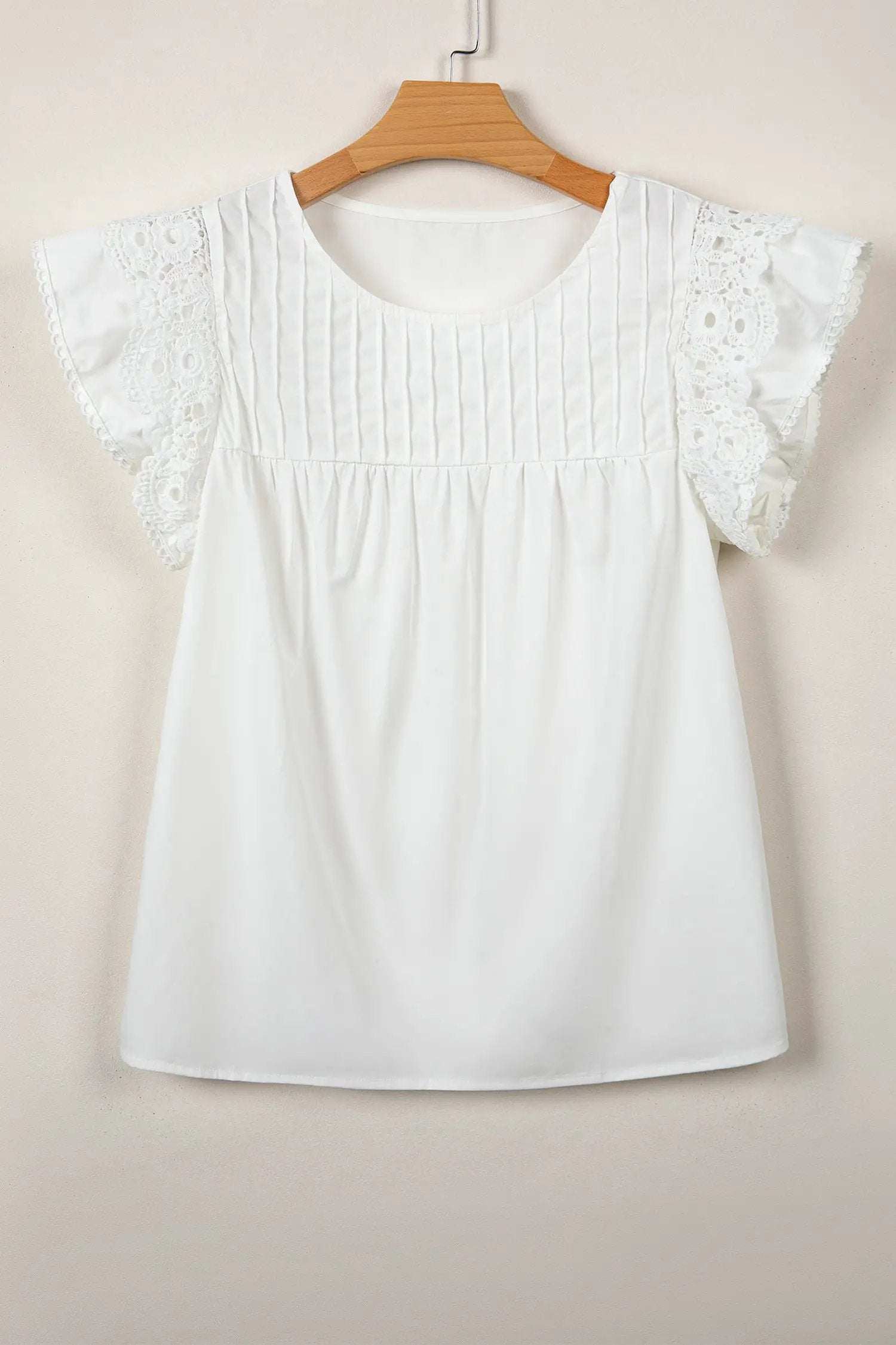 White Southern Charm blouse with lace detail flutter sleeves and pleated round neck