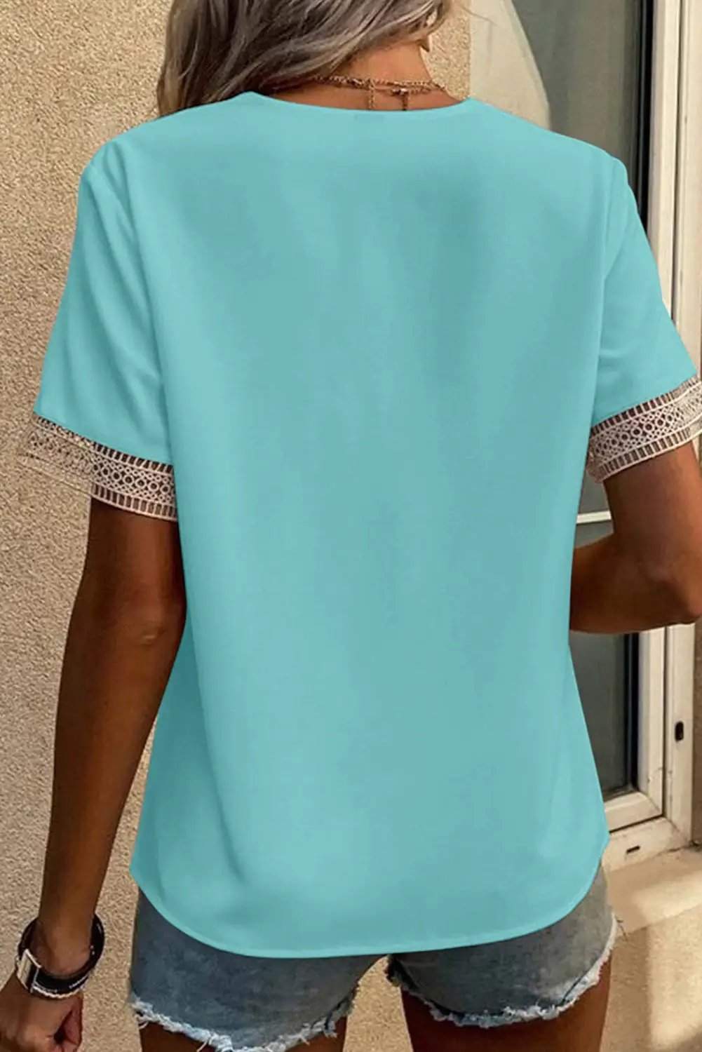 Boho Chic lace trim V-neck blouse with short sleeves and relaxed fit for women