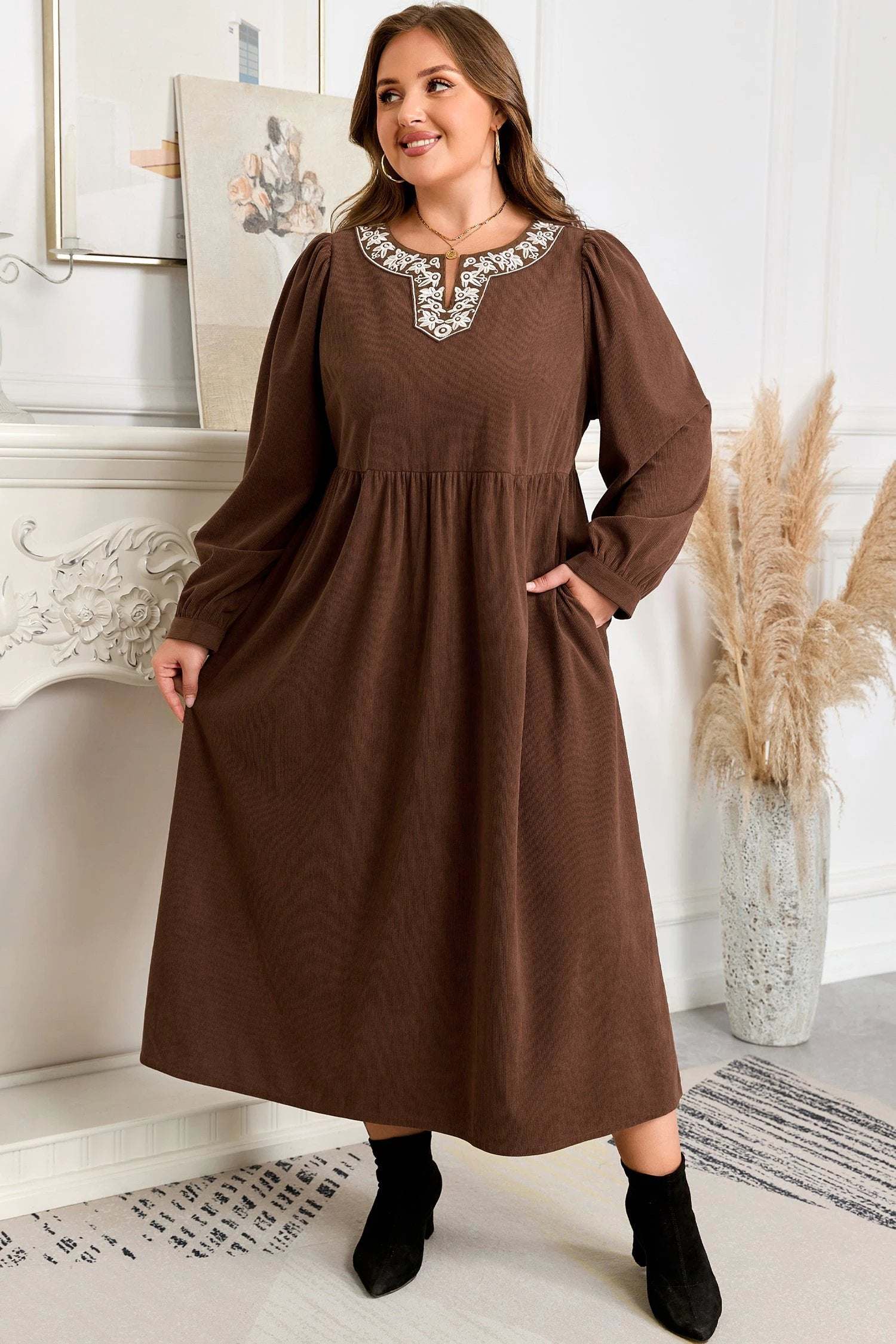 Plus size embroidered midi dress with notched neckline and long sleeves showcasing main character energy style
