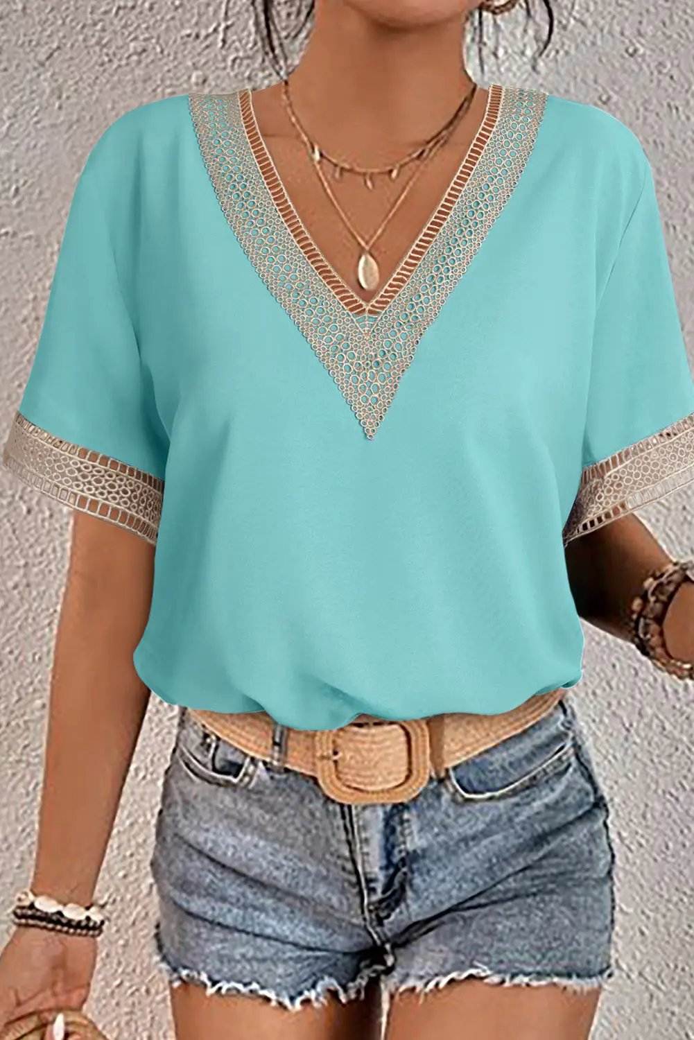 Boho Chic lace trim V-neck blouse with short sleeves and relaxed fit