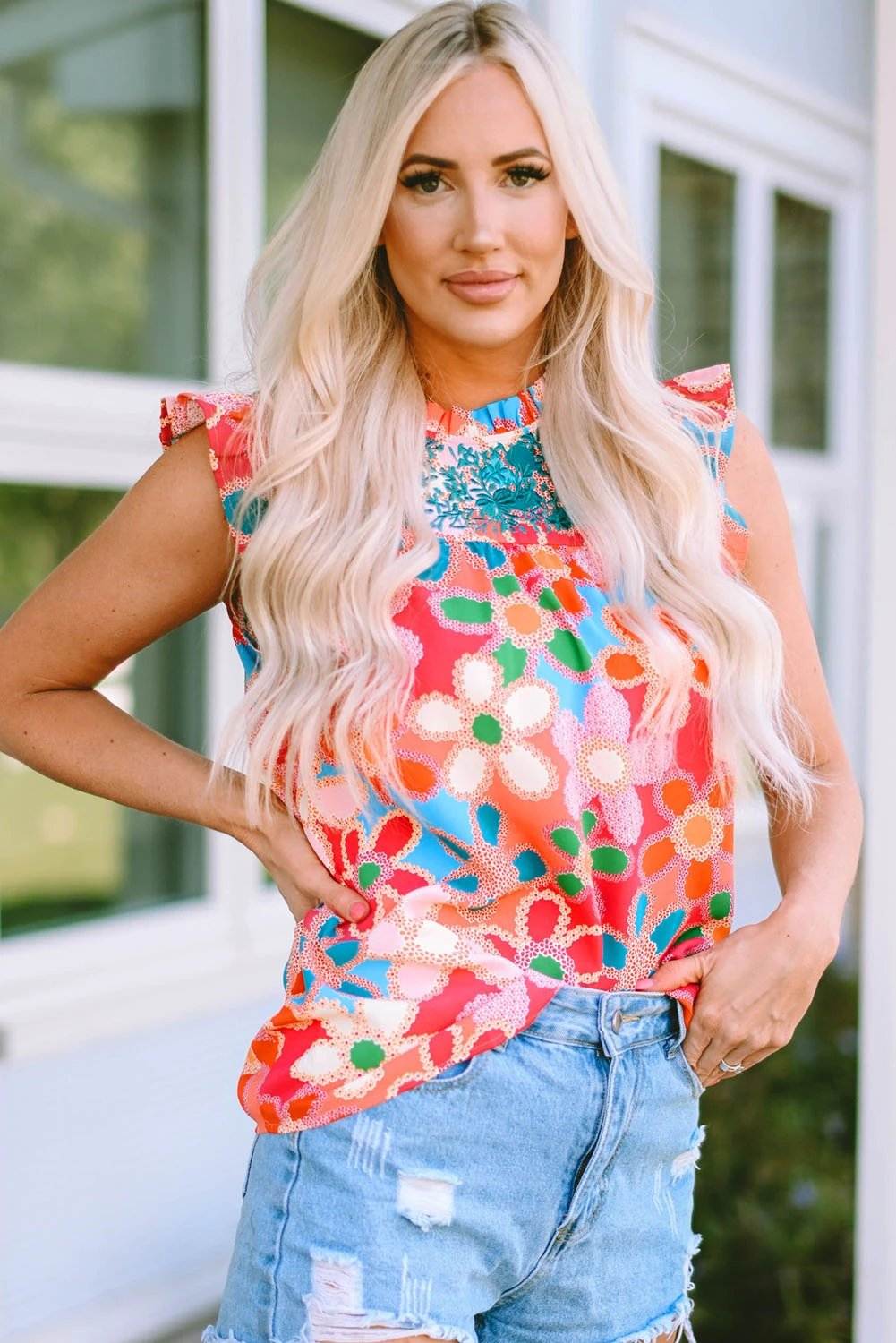 Pink embroidered floral print tank top with ruffle trim for summer wear