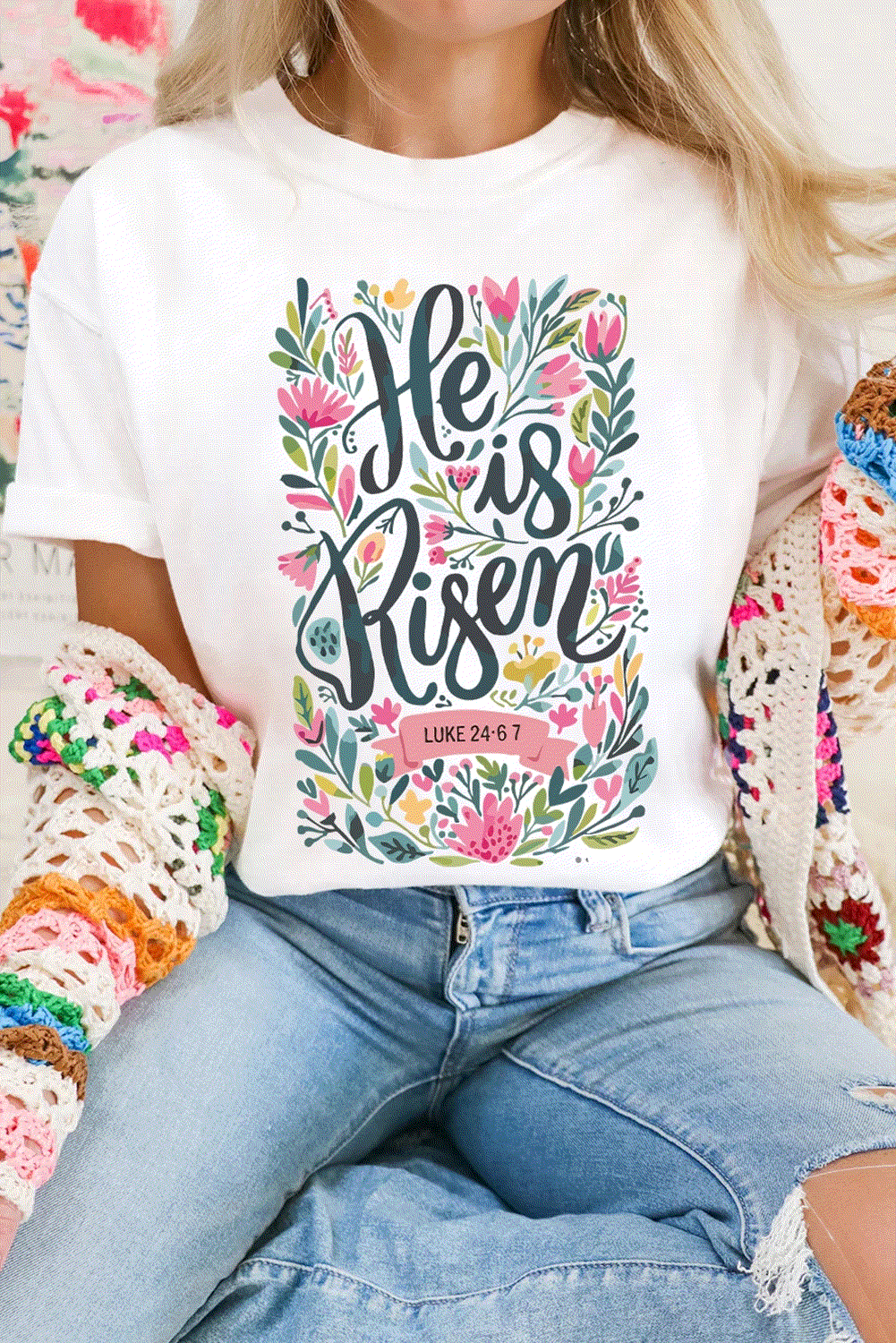 White "He Is Risen" floral printed t-shirt with vibrant spring flowers for Sunday plans
