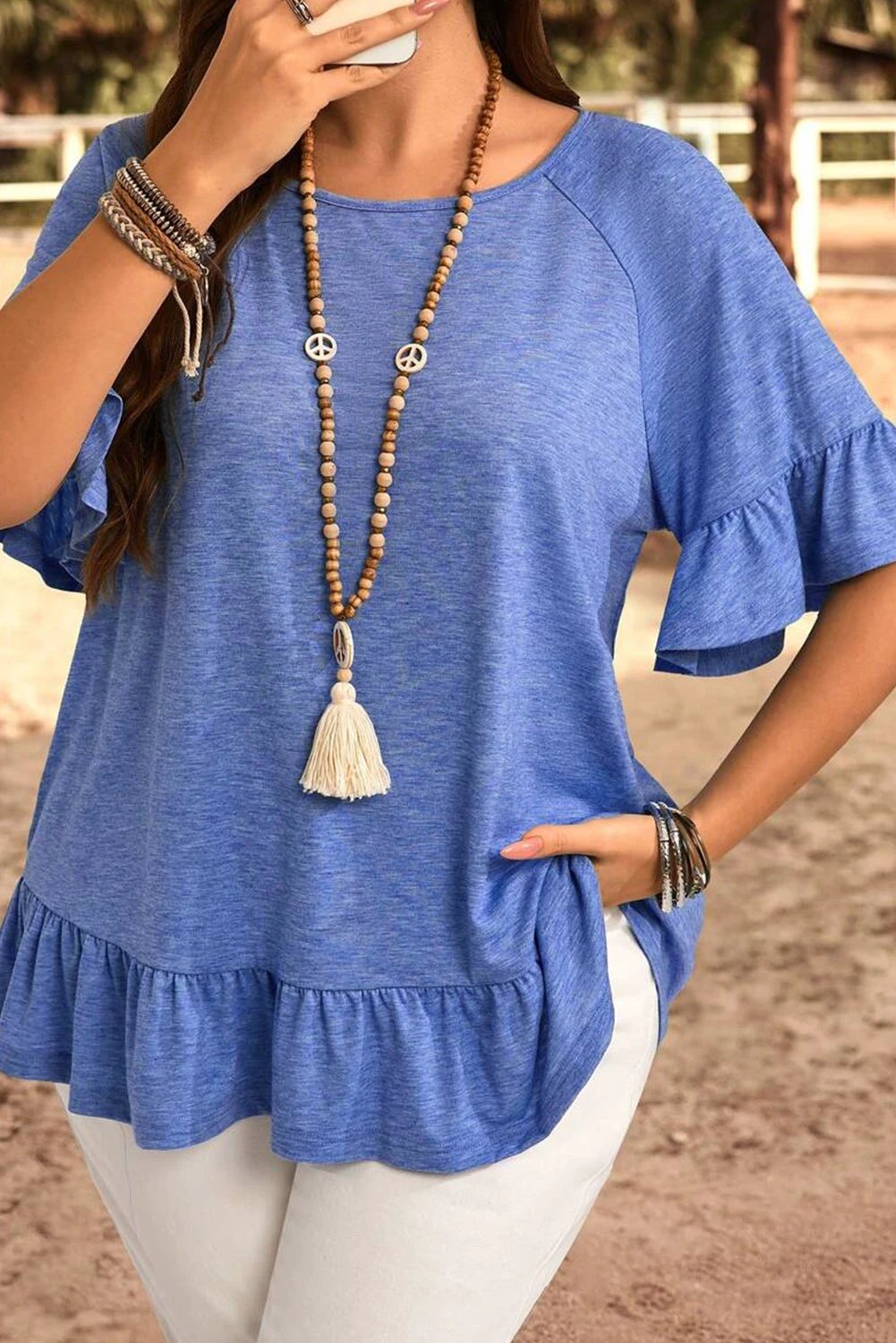 Plus size dusk blue ruffled short sleeve blouse with relaxed fit and flutter sleeves