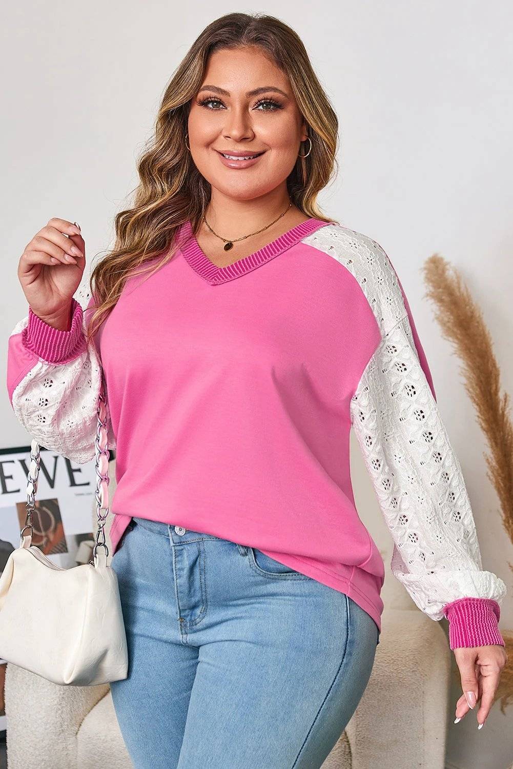 Plus size V-neck top with lace stripe sleeves and corded trim on soft knit fabric