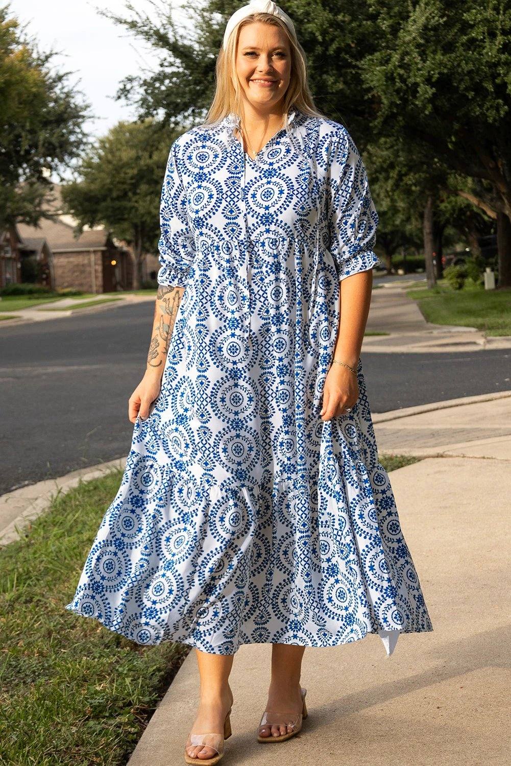Plus size blue and white geometric print maxi dress with lace-up notch neck and relaxed A-line silhouette