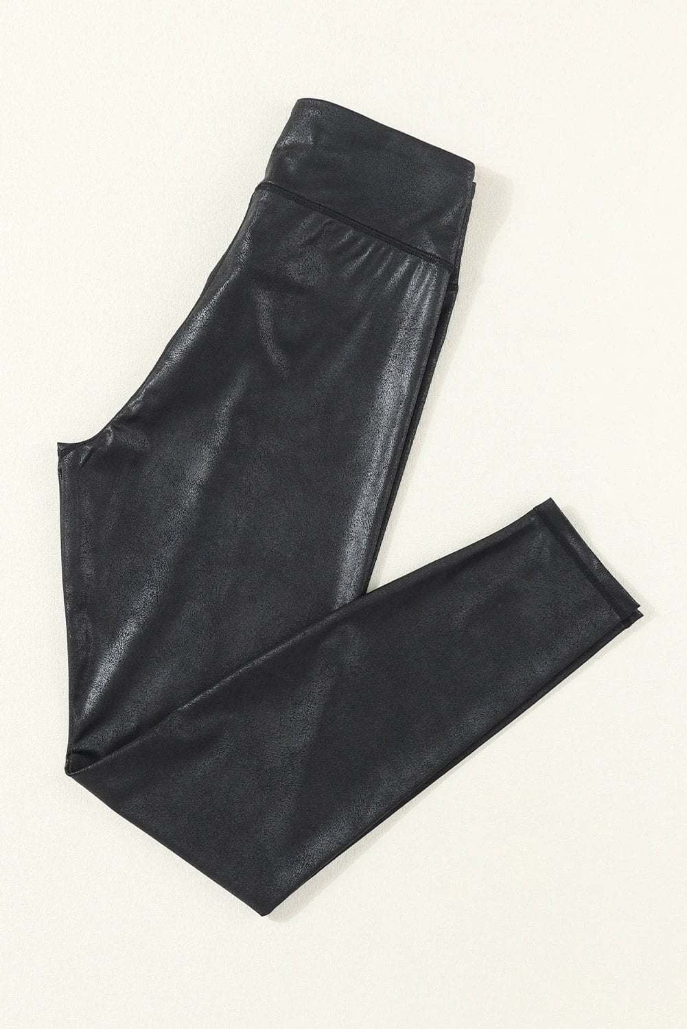 black crossed dip waist sleek leather leggings for women casual everyday outfit