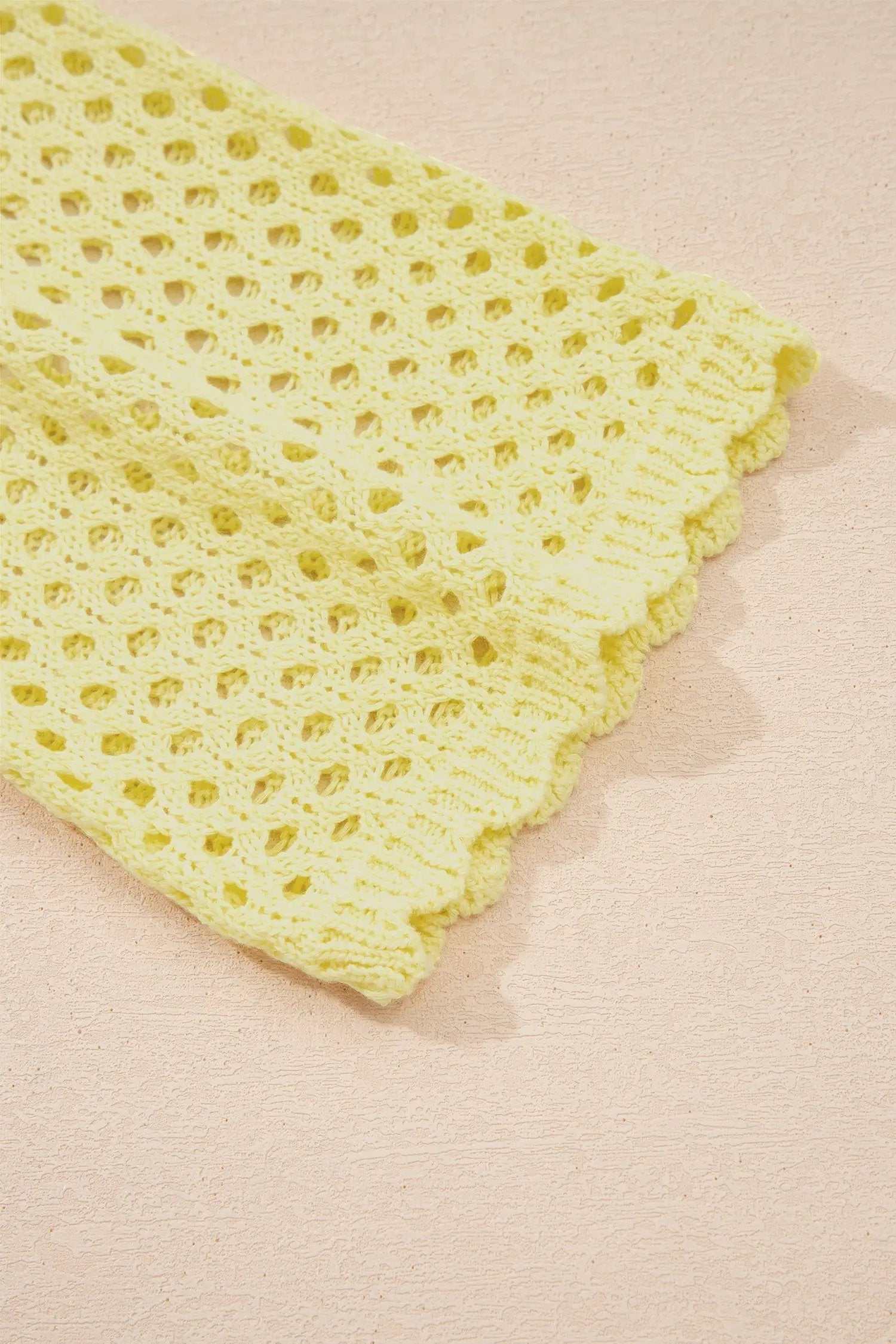 Hollow Out Knit Top with scalloped trim and long sleeves
