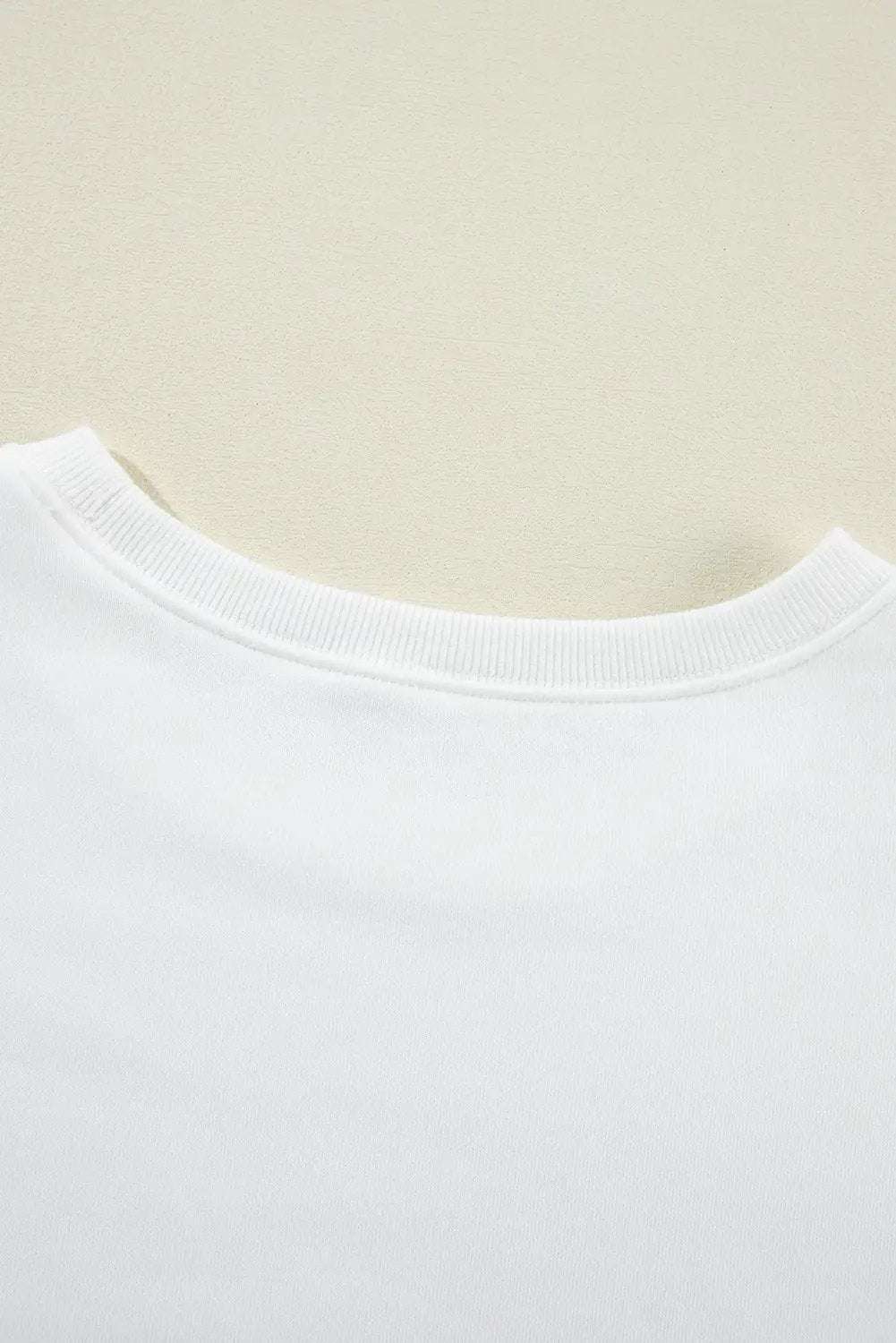 Oversized white American flag graphic sweatshirt with distressed print and drop-shoulder design