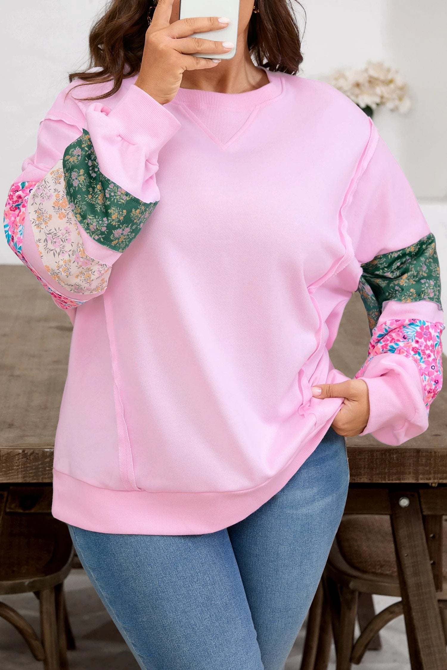 Plus size floral patched sleeve ribbed trim sweatshirt with relaxed fit