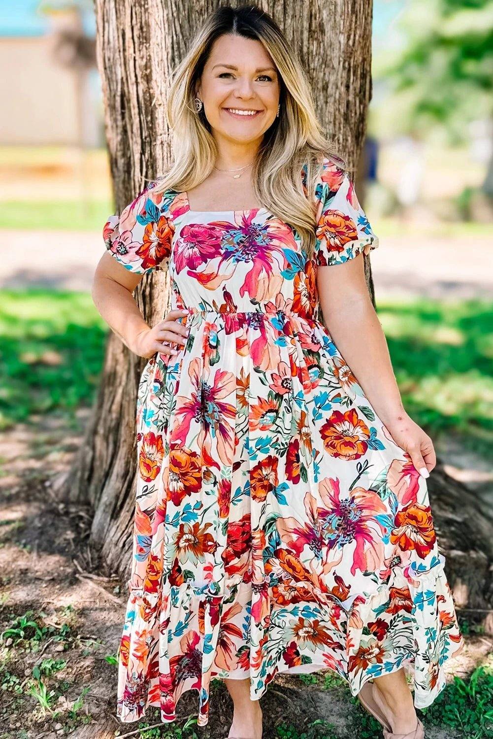 Plus size Sunday Ready floral midi dress with square neckline and puff sleeves on white background